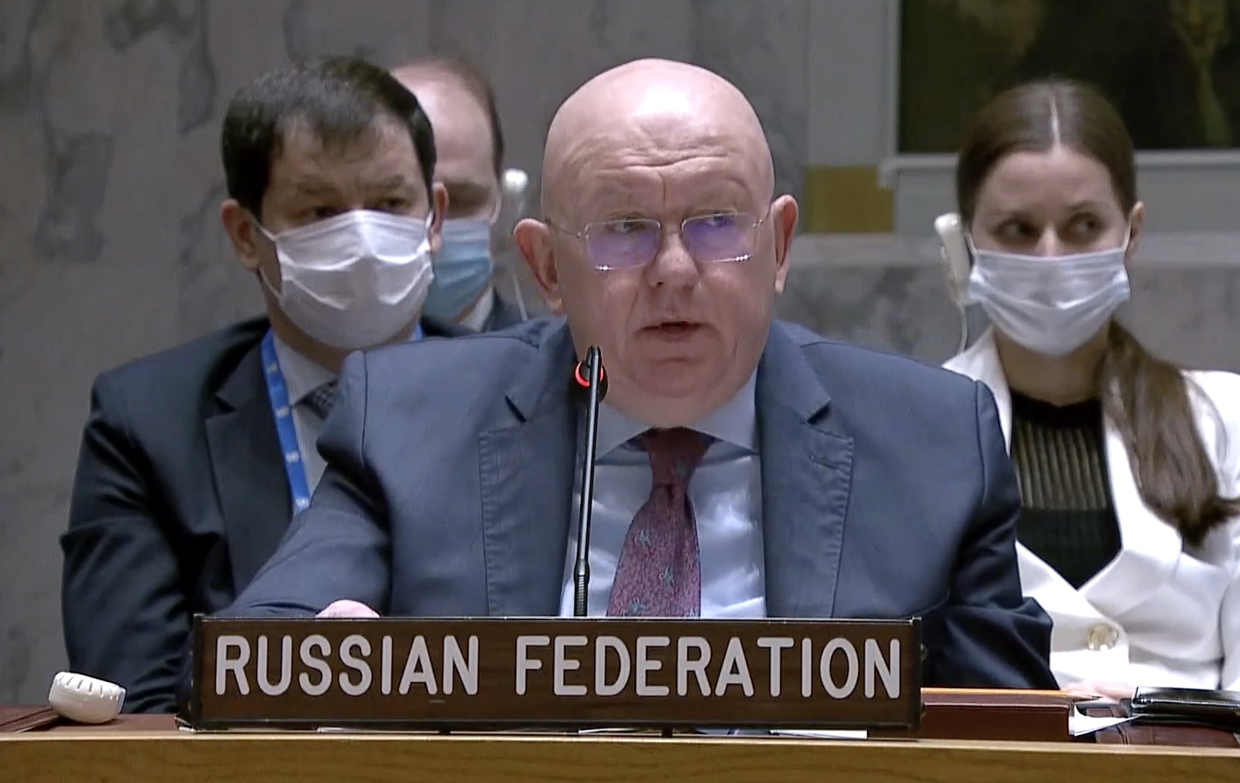 Russian Ambassador to the United Nations Vasily Nebenzya speaks during a Security Council meeting, Friday, March 11, 2022, at UN headquarters. The Russian request for the Security Council meeting followed a U.S. rejection of Russian accusations that Ukraine is operating chemical and biological labs with U.S. support. (UNTV via AP)