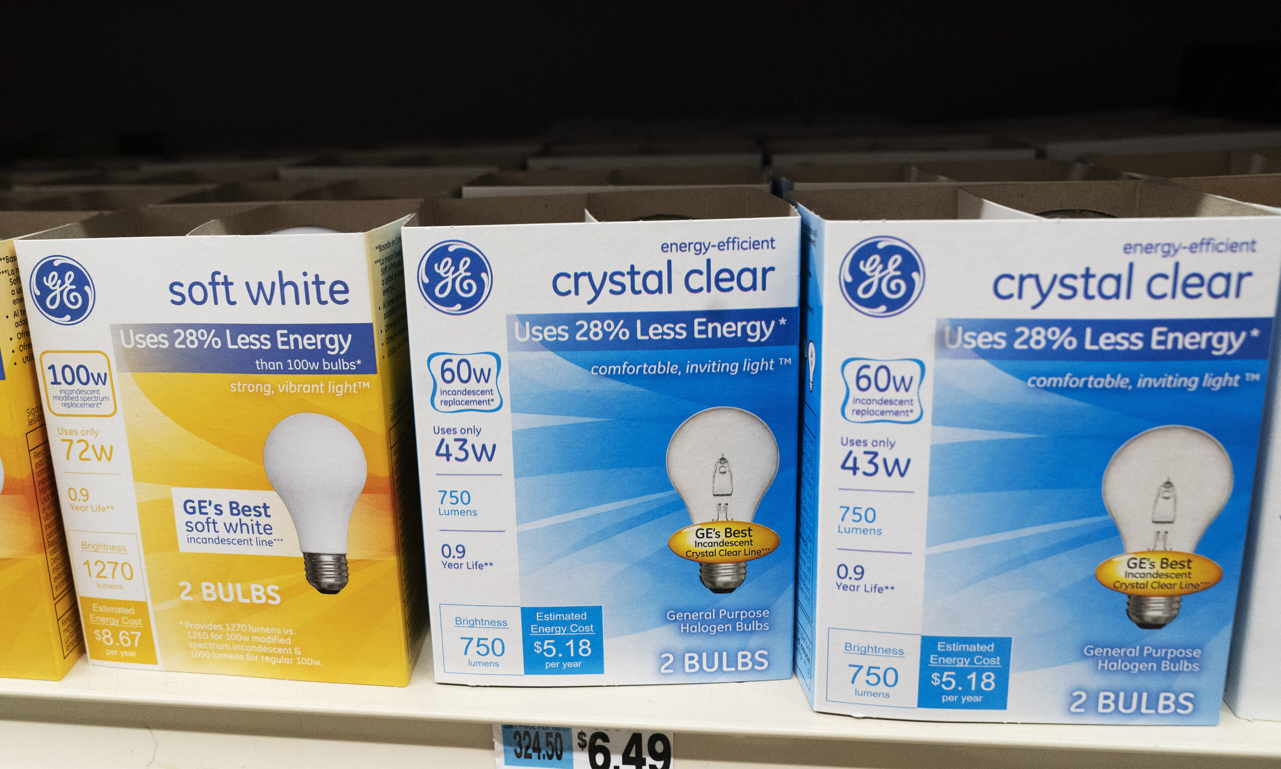 FILE - General Electric light bulbs are displayed in a supermarket April 5, 2021 in New York. The Biden administration is scrapping old-fashioned incandescent light bulbs. Rules finalized by the Energy Department will require manufacturers to sell energy-efficient lightbulbs, accelerating a longtime industry practice to use compact fluorescent and LED bulbs that last 25 to 50 times longer than incandescent bulbs. (AP Photo/Mark Lennihan, File)