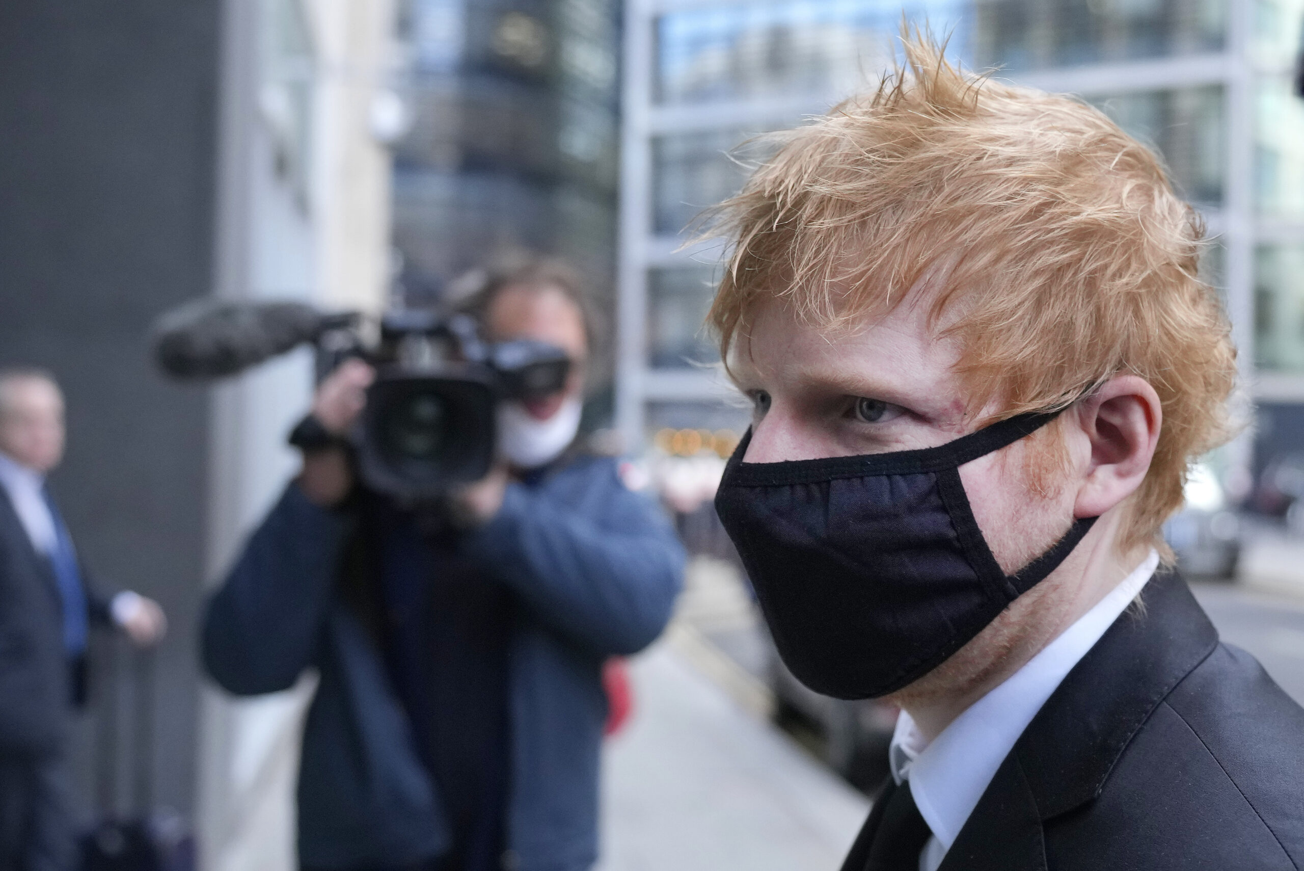FILE - Musician Ed Sheeran arrives at the Rolls Building, High Court in central London, on March 15, 2022. Grammy Award-winning songwriter Ed Sheeran has won Wednesday, April 6, 2022, a U.K. copyright battle over the 2017 hit “Shape of You.’’ (AP Photo/Frank Augstein)