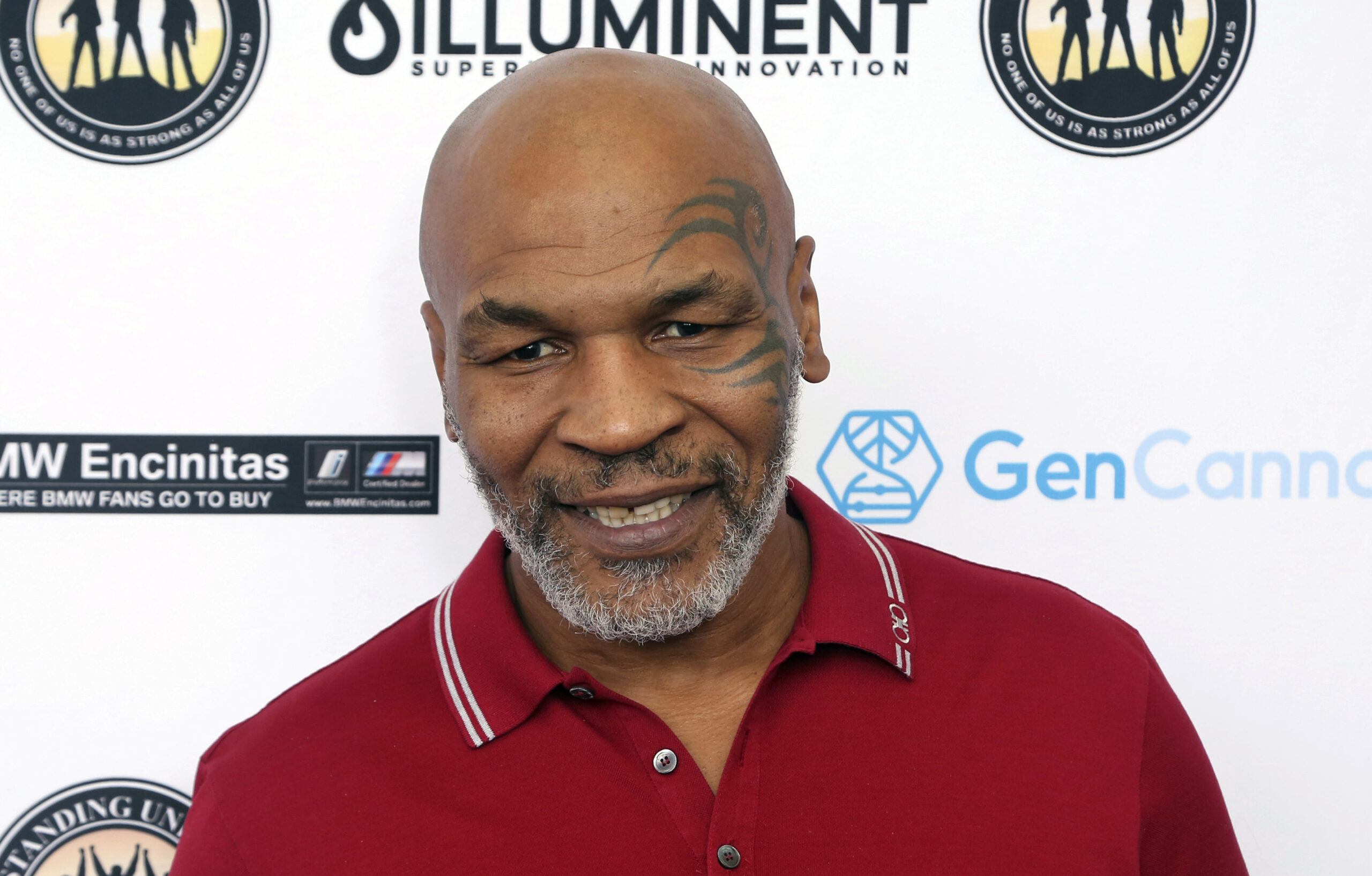 FILE - In this Aug. 2, 2019 photo, Mike Tyson attends a celebrity golf tournament in Dana Point, Calif. Authorities are investigating after cellphone video appears to show Mike Tyson hitting another passenger on a plane at San Francisco International Airport. (Photo by Willy Sanjuan/Invision/AP, File)