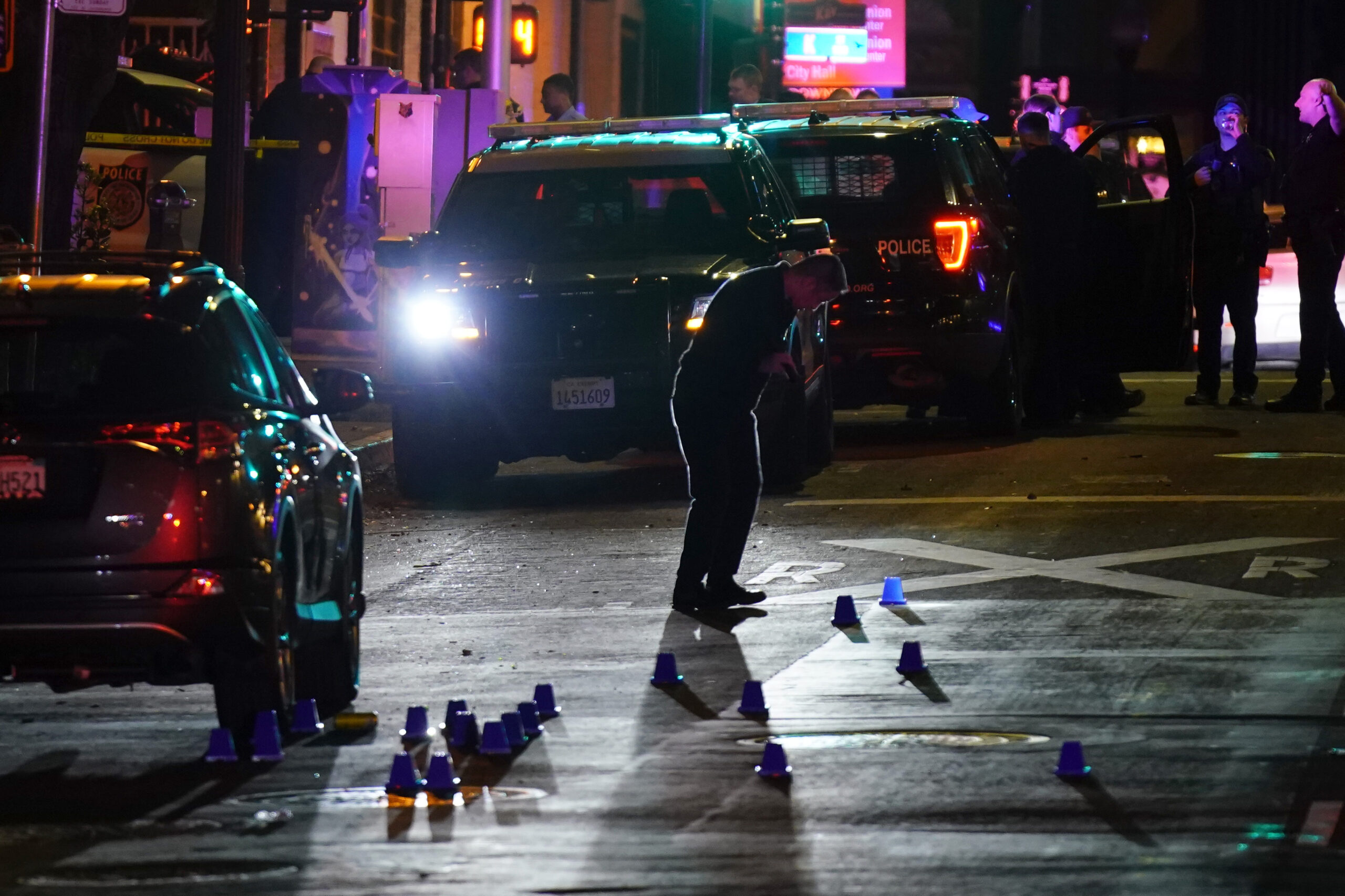 Investigators search for evidence in the area of a mass shooting In Sacramento, Calif. April 3, 2022. (AP Photo/Rich Pedroncelli)