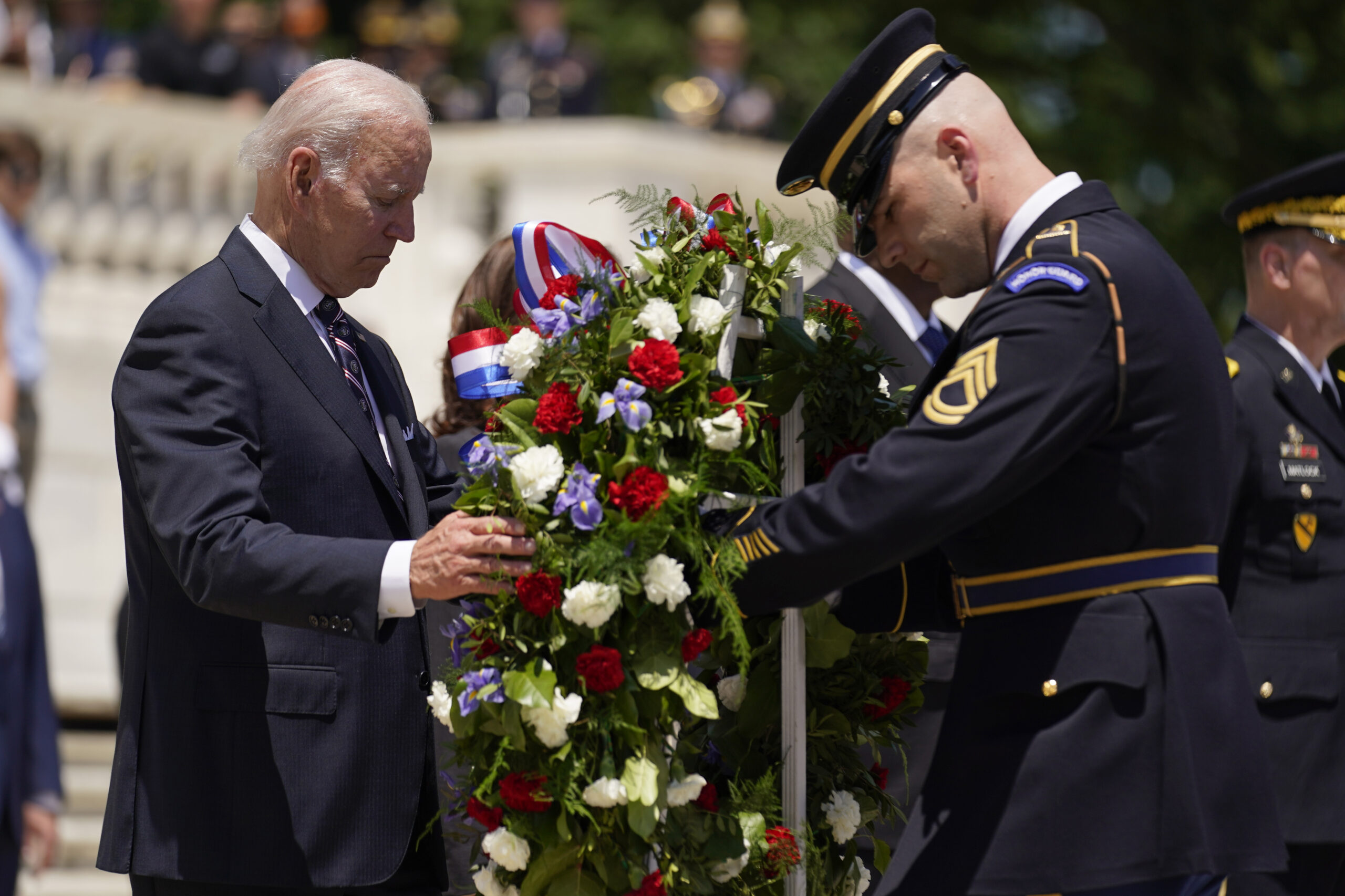 President Joe Biden lays a wreath at The Tomb of the Unknown Soldier at Arlington National Cemetery on Memorial Day, Monday, May 30, 2022, in Arlington, Va. (AP Photo/Andrew Harnik)