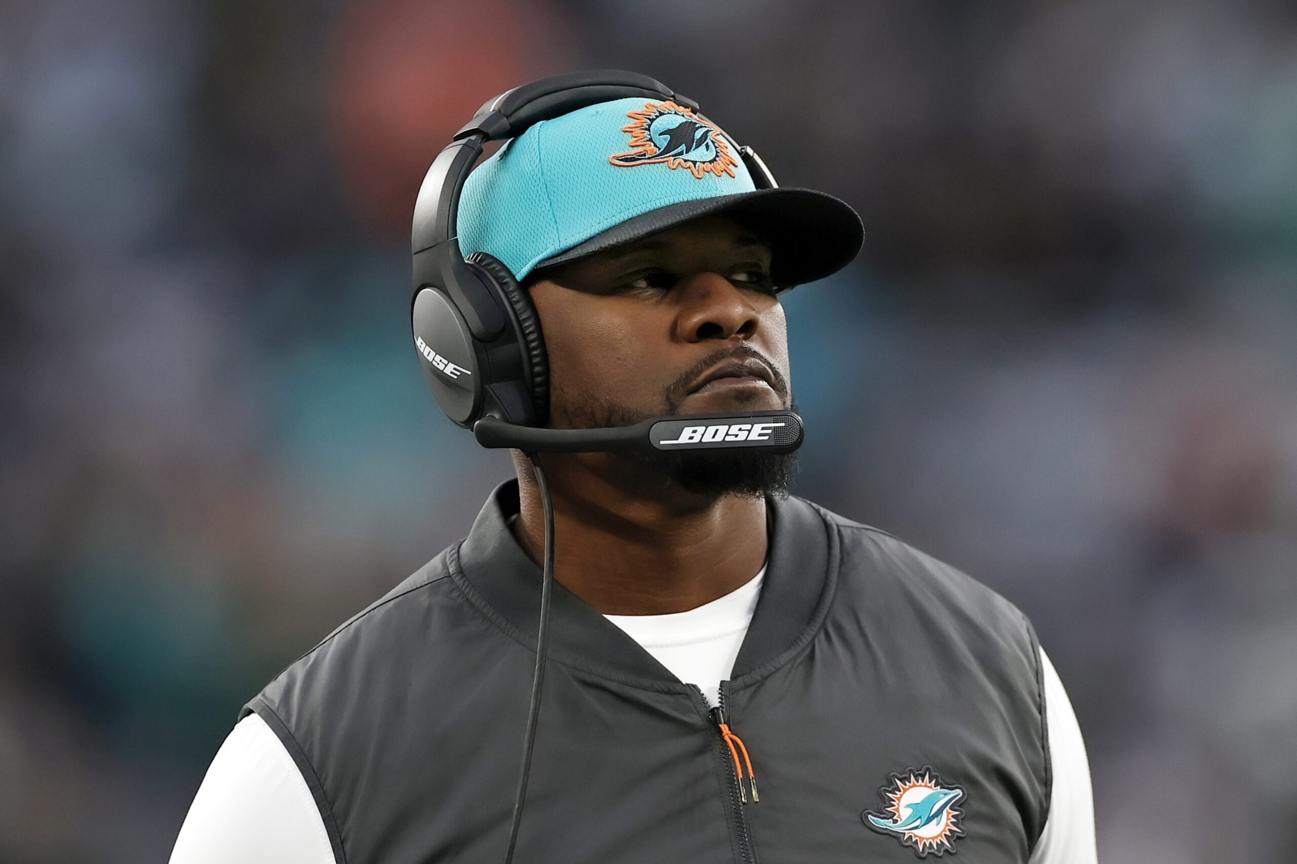 FILE - Miami Dolphins head coach Brian Flores stands on the sidelines during an NFL football game against the New York Jets on Nov. 21, 2021, in East Rutherford, N.J. Flores' lawyer told a judge Monday that arbitration is the wrong way to resolve the lawsuit, alleging racist hiring practices within the league, in part because NFL Commissioner Roger Goodell would be the arbitrator and that would be “unconscionable.” (AP Photo/Adam Hunger, File)