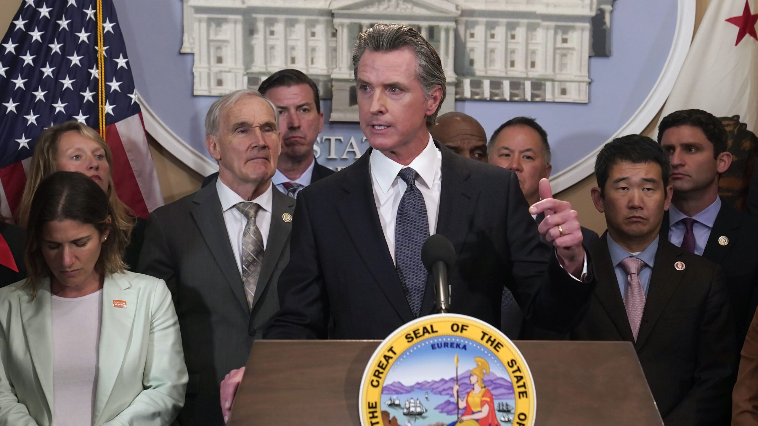 California Gov. Gavin Newsom discusses the recent mass shooting in Texas, during a news conference in Sacramento, Calif., Wednesday, May 25, 2022. Flanked by lawmakers from both houses of the state legislature, Newsom said he is ready to sign more restrictive gun measures passed by lawmakers.(AP Photo/Rich Pedroncelli)