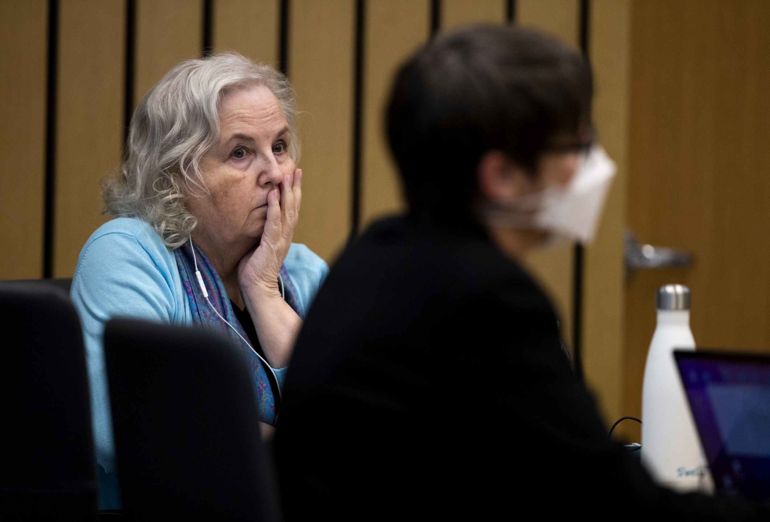 FILE - Romance writer Nancy Crampton Brophy, left, accused of killing her husband, Dan Brophy, in June 2018, watches proceedings in court in Portland, Ore., Monday, April 4, 2022. A jury in Portland, Oregon, has convicted the self-published romance novelist — who once wrote an essay titled "How to Kill Your Husband" — of fatally shooting her husband four years ago. (Dave Killen/The Oregonian via AP, Pool, File Photo)
