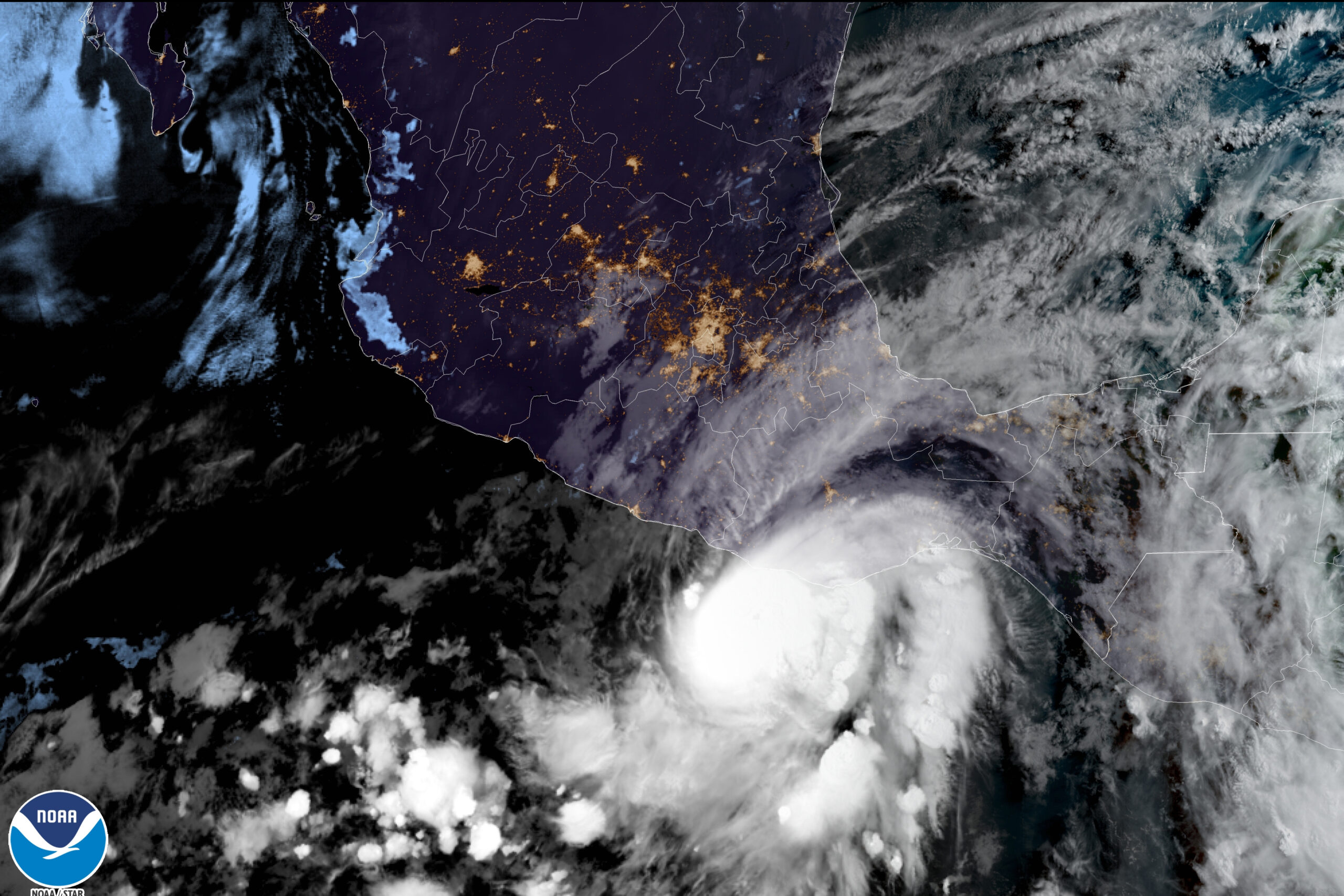 This satellite image made available by NOAA shows Hurricane Agatha off the Pacific coast of Oaxaca state, Mexico on Monday, May 30, 2022, at 8:30 a.m. EDT. (NOAA via AP)