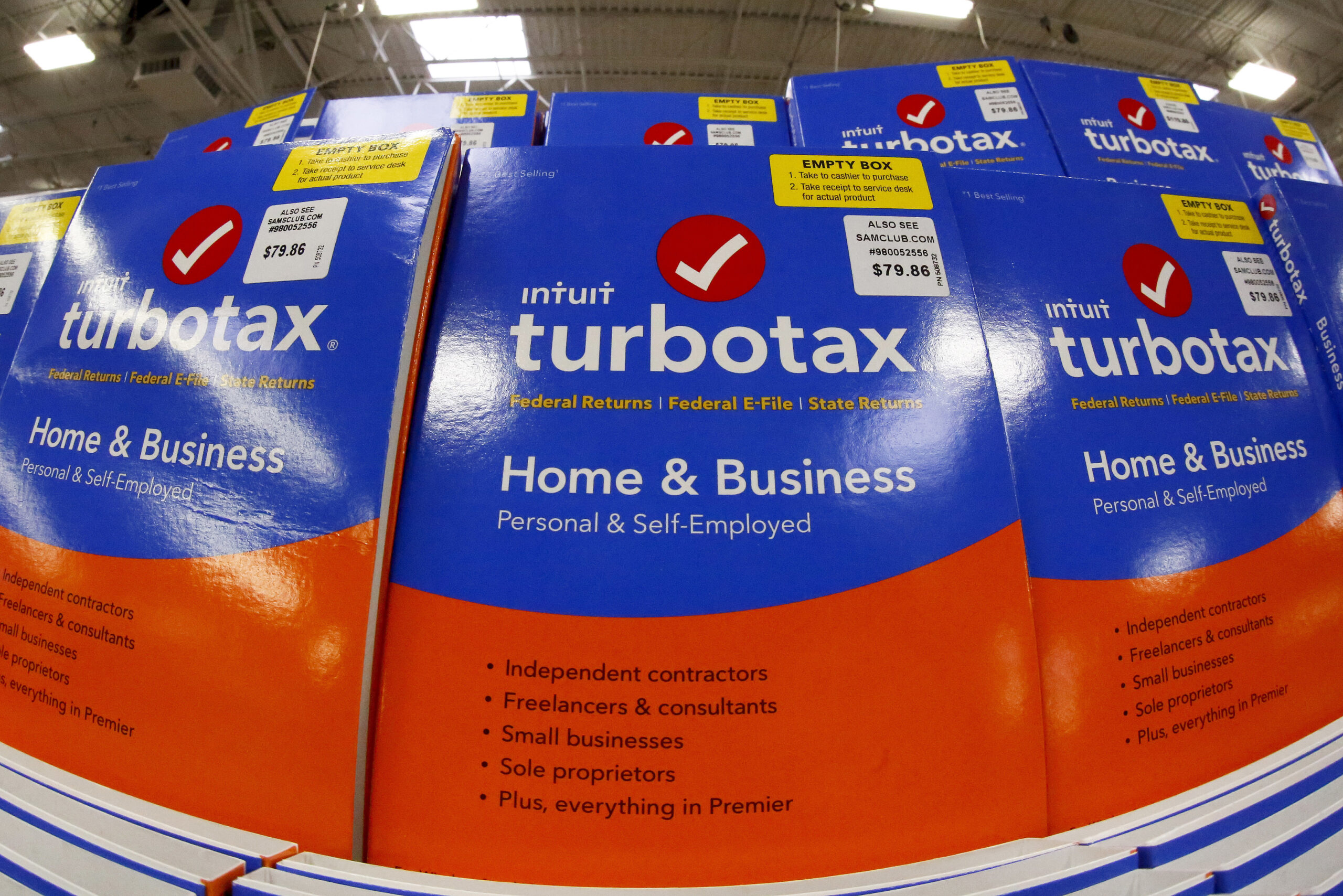 This Thursday, Feb. 22, 2018 photo shows a display of TurboTax software in a Sam's Club in Pittsburgh. Under the terms of a settlement signed by the attorneys general of all 50 states, Mountain View, California-based Intuit Inc. will suspend TurboTax’s “free, free, free” ad campaign and pay restitution to nearly 4.4 million taxpayers, New York Attorney General Letitia James said, Wednesday, May 4, 2022.(AP Photo/Gene J. Puskar)