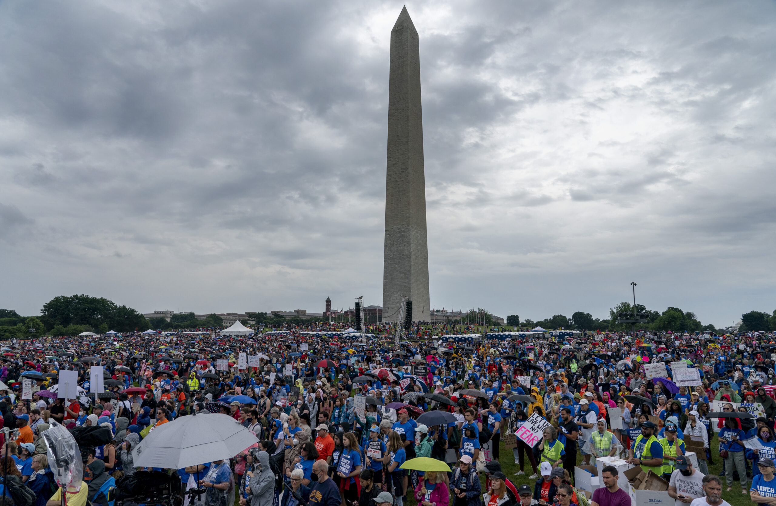 People participate in the second March for Our Lives rally in support of gun control in front of the Washington Monument, Saturday, June 11, 2022, in Washington. The rally is a successor to the 2018 march organized by student protestors after the mass shooting at a high school in Parkland, Fla. (AP Photo/Gemunu Amarasinghe)