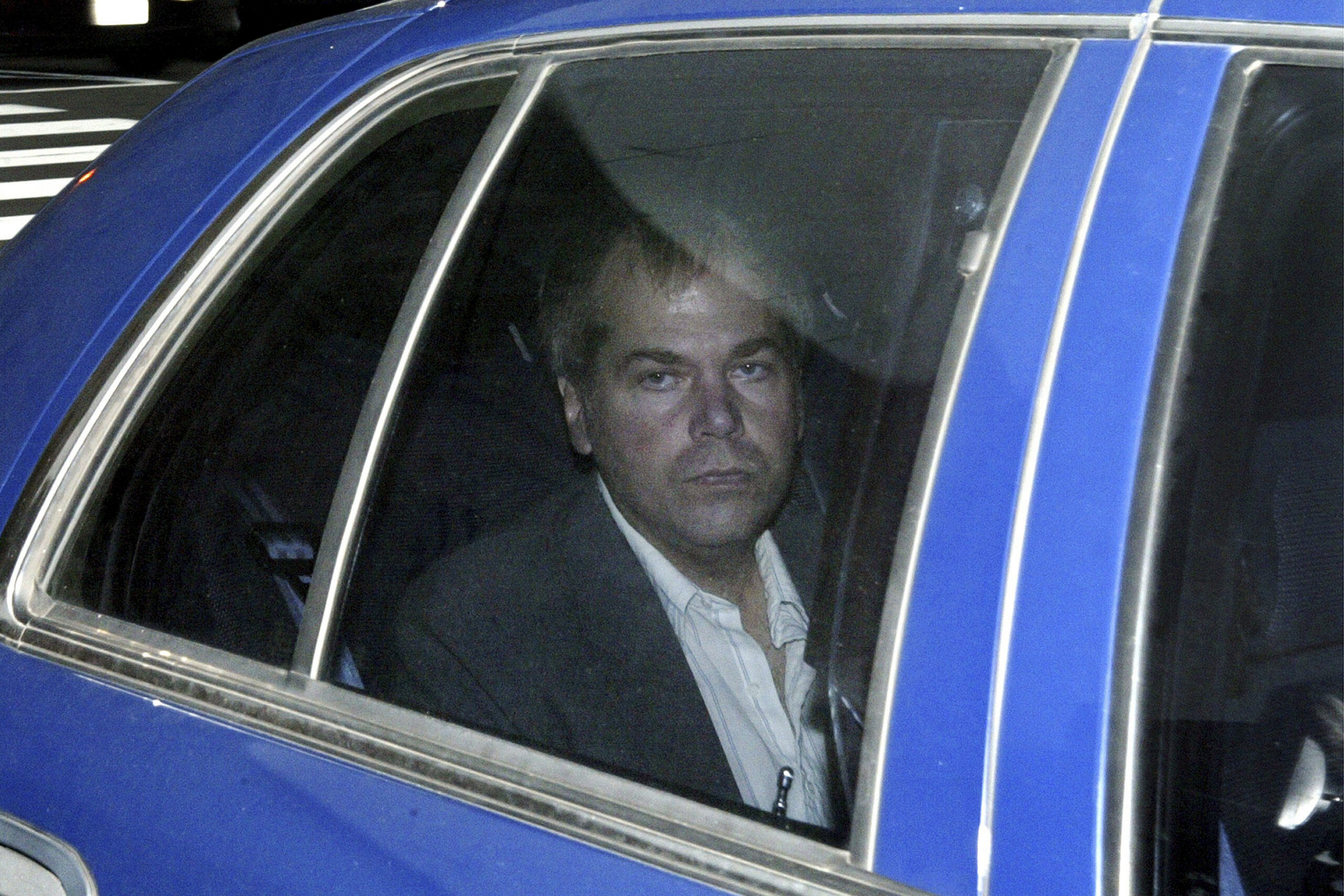 FILE — John Hinckley Jr. arrives at U.S. District Court in Washington, Nov 18, 2003. A July 8, 2022, concert by Hinckley, who shot and wounded President Ronald Reagan in 1981, has been canceled on Wednesday, June 15, citing "very real and worsening threats and hate," by the Market Hotel, in the Brooklyn borough of New York. (AP Photo/Evan Vucci, File)
