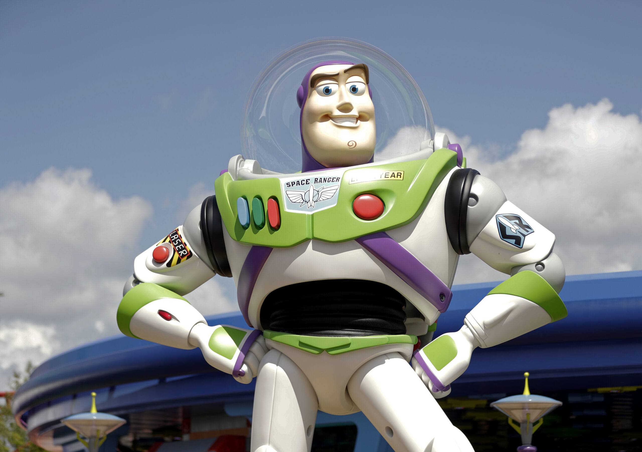 FILE - Character Buzz Lightyear stands near the entrance to the Aliens Swirling Saucers ride at Toy Story Land in Disney's Hollywood Studios at Walt Disney World in Lake Buena Vista, Fla., June 23, 2018. Malaysia's film censors said Friday, June 17, 2022, that it was Disney's decision to ax the animated film “Lightyear” from the country's cinemas after refusing to cut scenes promoting homosexuality. (AP Photo/John Raoux, File)