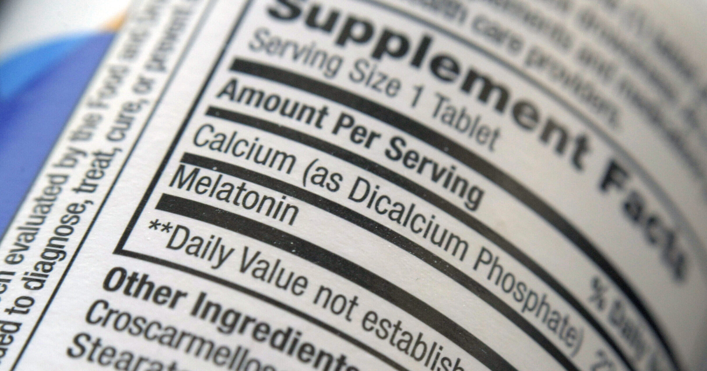 The label for a bottle of melatonin pills is seen in New York on Thursday, June 2, 2022. Melatonin is a hormone that helps control the body's sleep cycle. (AP Photo/Patrick Sison)