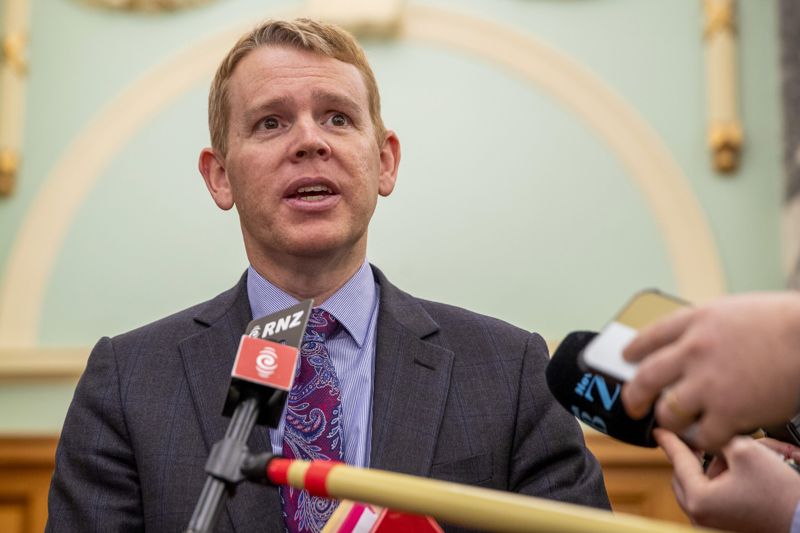New Zealand Police Minister Chris Hipkins during his press conference at Parliament, Wellington, New Zealand, Thursday, June 30, 2022. New Zealand's government has declared that American far-right groups the Proud Boys and The Base are terrorist organizations. (Mark Mitchell/New Zealand Herald via AP)