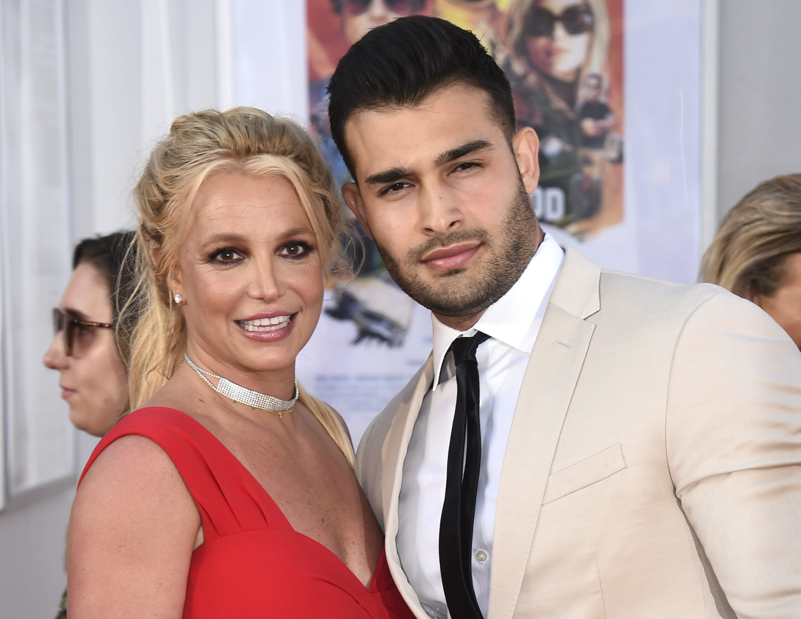 FILE - Britney Spears and Sam Asghari appear at the Los Angeles premiere of "Once Upon a Time in Hollywood" on July 22, 2019. Spears has married her longtime partner Sam Asghari at a Southern California ceremony that came months after the pop superstar won her freedom from a court conservatorship. Asghari’s representative Brandon Cohen confirmed the couple’s nuptials. (Photo by Jordan Strauss/Invision/AP, File)