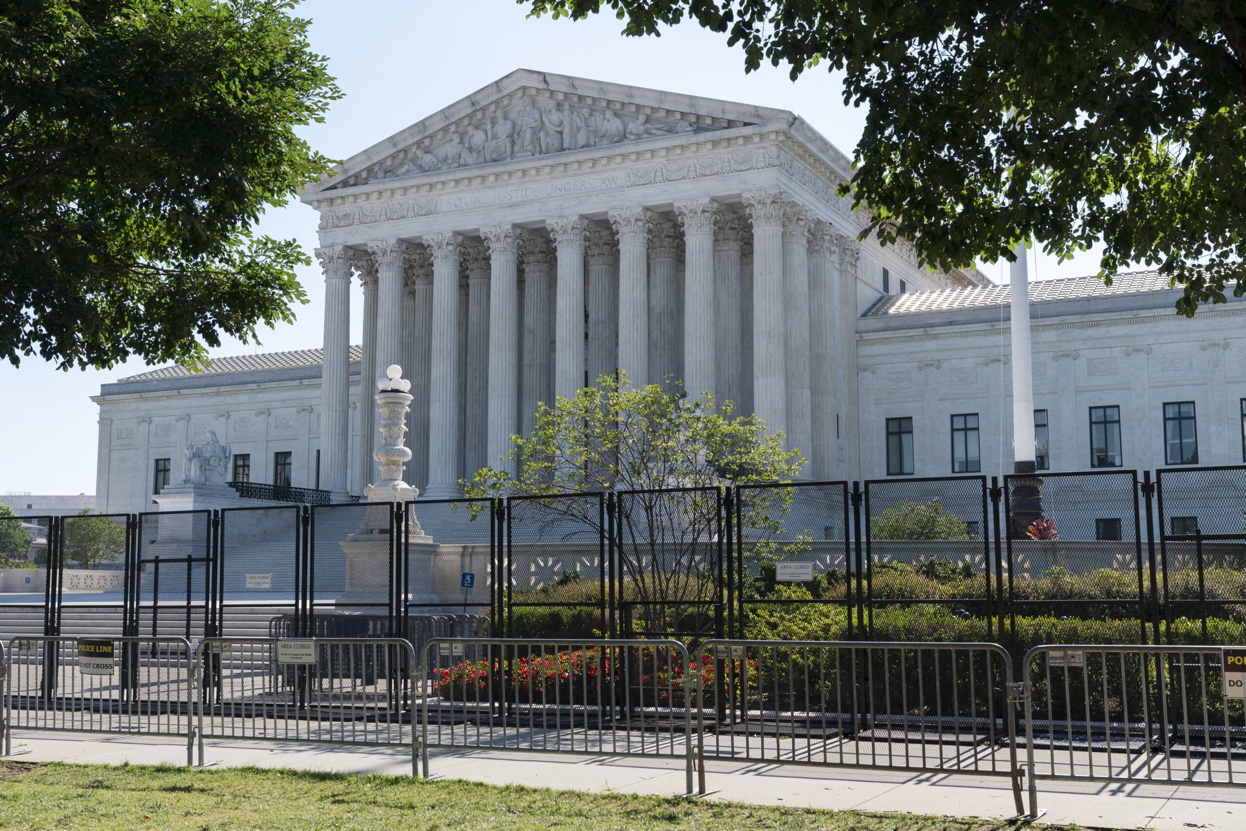 The Supreme Court is seen, Thursday, June 30, 2022, in Washington. The Supreme Court has ruled that the Biden administration properly ended a Trump-era policy forcing some U.S. asylum-seekers to wait in Mexico. The justices’ 5-4 decision for the administration came in a case about the “Remain in Mexico” policy under President Donald Trump. (AP Photo/Jacquelyn Martin)