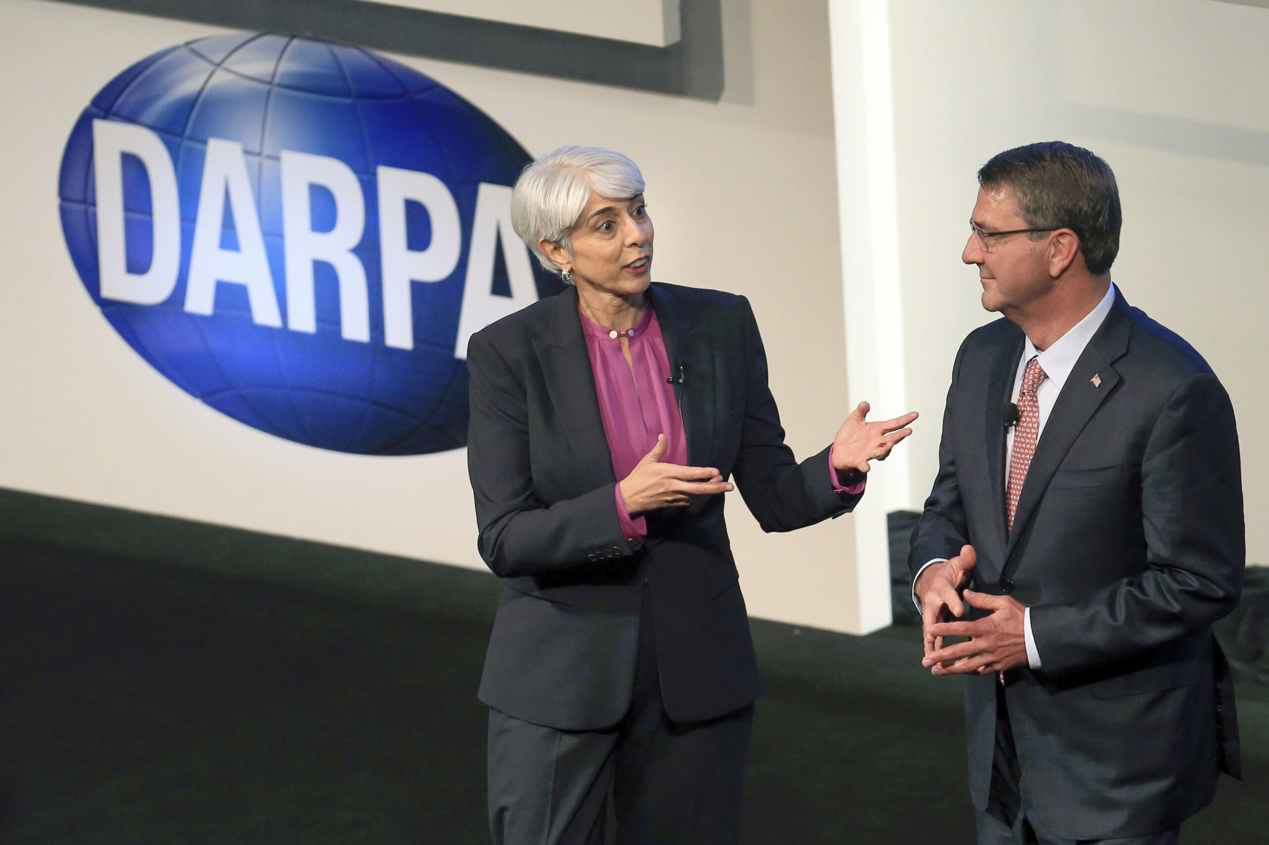 FILE - Arati Prabhakar, left, the director of Defense Advanced Research Projects Agency speaks after introducing then-Defense Secretary Ash Carter to speak Sept. 9, 2015, at the opening of the DARPA conference at the America's Center in St. Louis. President Joe Biden has chosen Arati Prabhakar to be his science adviser. (Christian Gooden/St. Louis Post-Dispatch via AP, File)