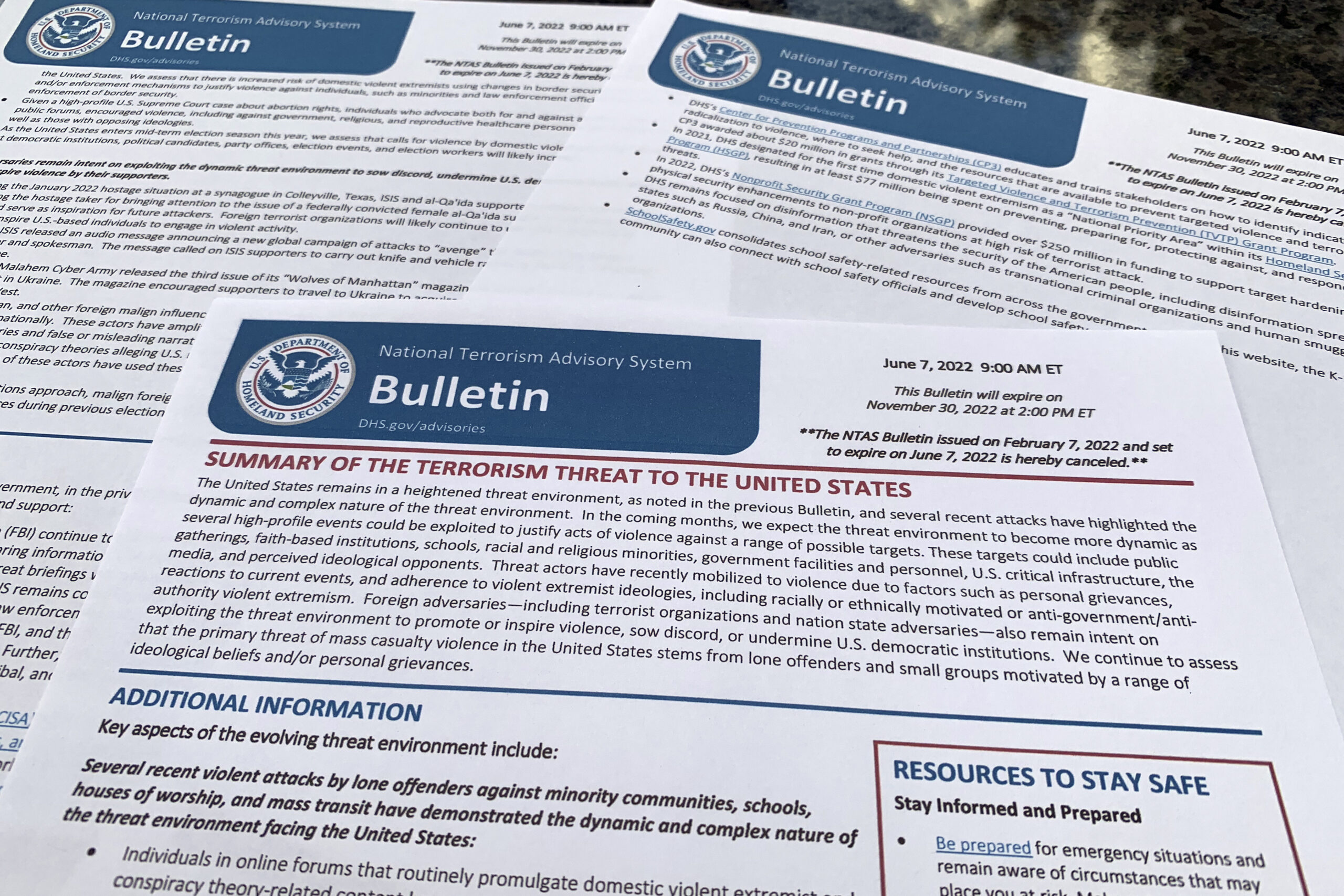 The bulletin issued by the Department of Homeland Security, outlining the current terrorism threat to the United States, is photographed Thursday, June 9, 2022. DHS warned June 7 that skewed framing of the subjects like abortion, guns, immigration and LGTBQ rights, could drive extremists to violently attack pubic places across the U.S. in the coming months. (AP Photo/Jon Elswick)