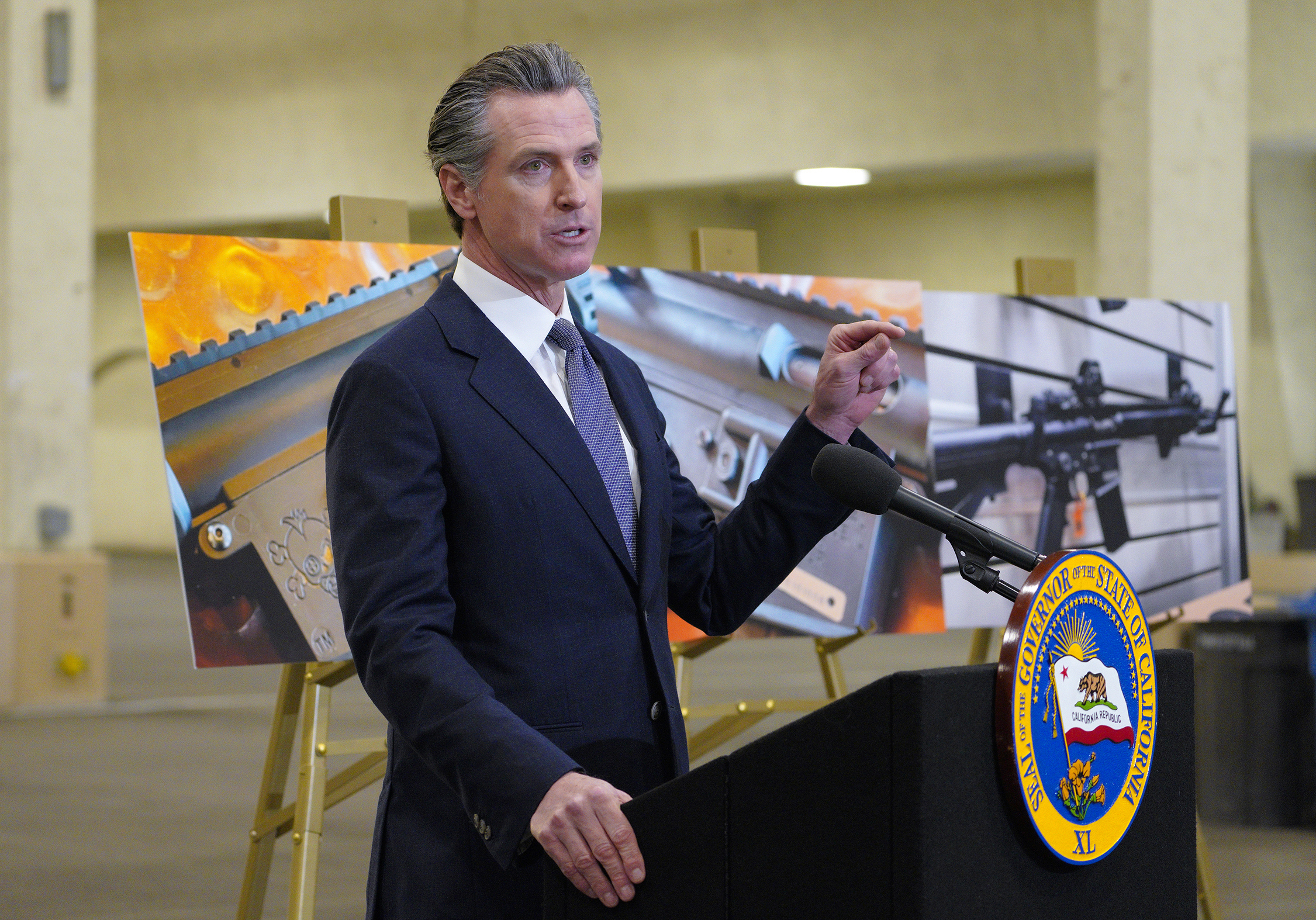 FILE - California Gov. Gavin Newsom speaks to reporters at Del Mar Fairgrounds on Feb. 18, 2022, in Del Mar, Calif. Newsom announced Friday, July 22, he will sign a controversial, first-in-the-nation gun control law patterned after a Texas anti-abortion law. (Nelvin C. Cepeda/The San Diego Union-Tribune via AP, File)
