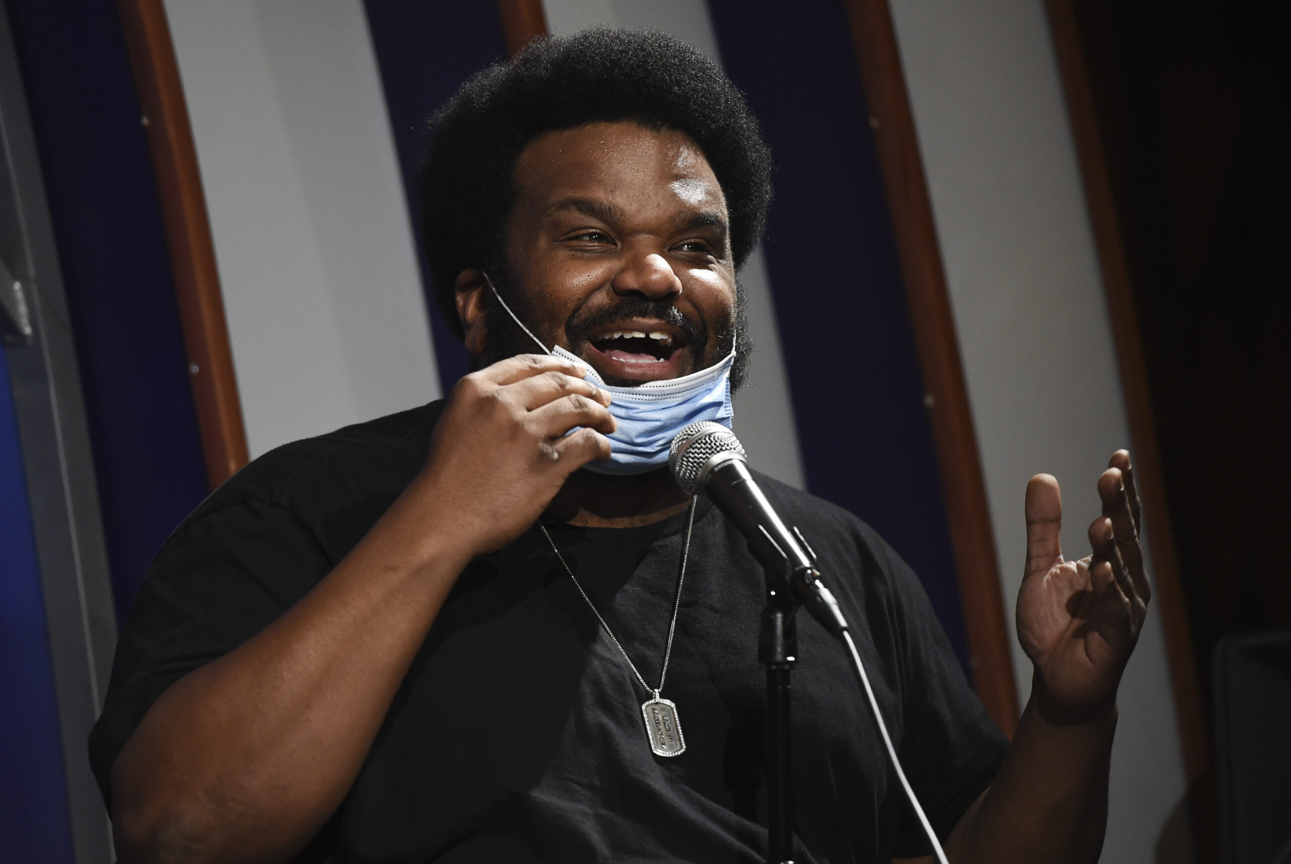 In this April 20, 2020, photo, comedian Craig Robinson performs at the Laugh Factory comedy club in Los Angeles. A man fired a gun inside a comedy club in North Carolina Saturday night, July 16, 2022 shortly after it was evacuated and before actor and comedian Craig Robinson was set to perform, police said. No one was injured. Club employees told WSOC-TV that the man waved a gun around and told everyone to leave before the venue emptied out. About 50 customers had been inside. (AP Photo/Chris Pizzello, file)