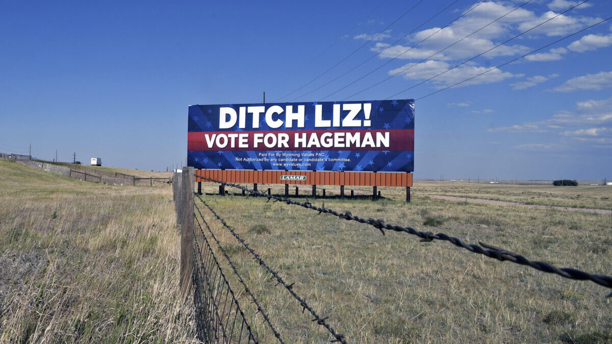 A billboard outside Cheyenne, Wyo., on July 19, 2022, calls on voters to cast their ballots for Harriet Hageman, who is running against incumbent Rep. Liz Cheney, R-Wyo., in the Republican primary election Aug. 16. Rep. Cheney is in the political fight of her life. Wyoming's congresswoman since 2016 is facing a Donald Trump-backed opponent, attorney Harriet Hageman, in the state's upcoming Republican primary. (AP Photo/Thomas Peipert)