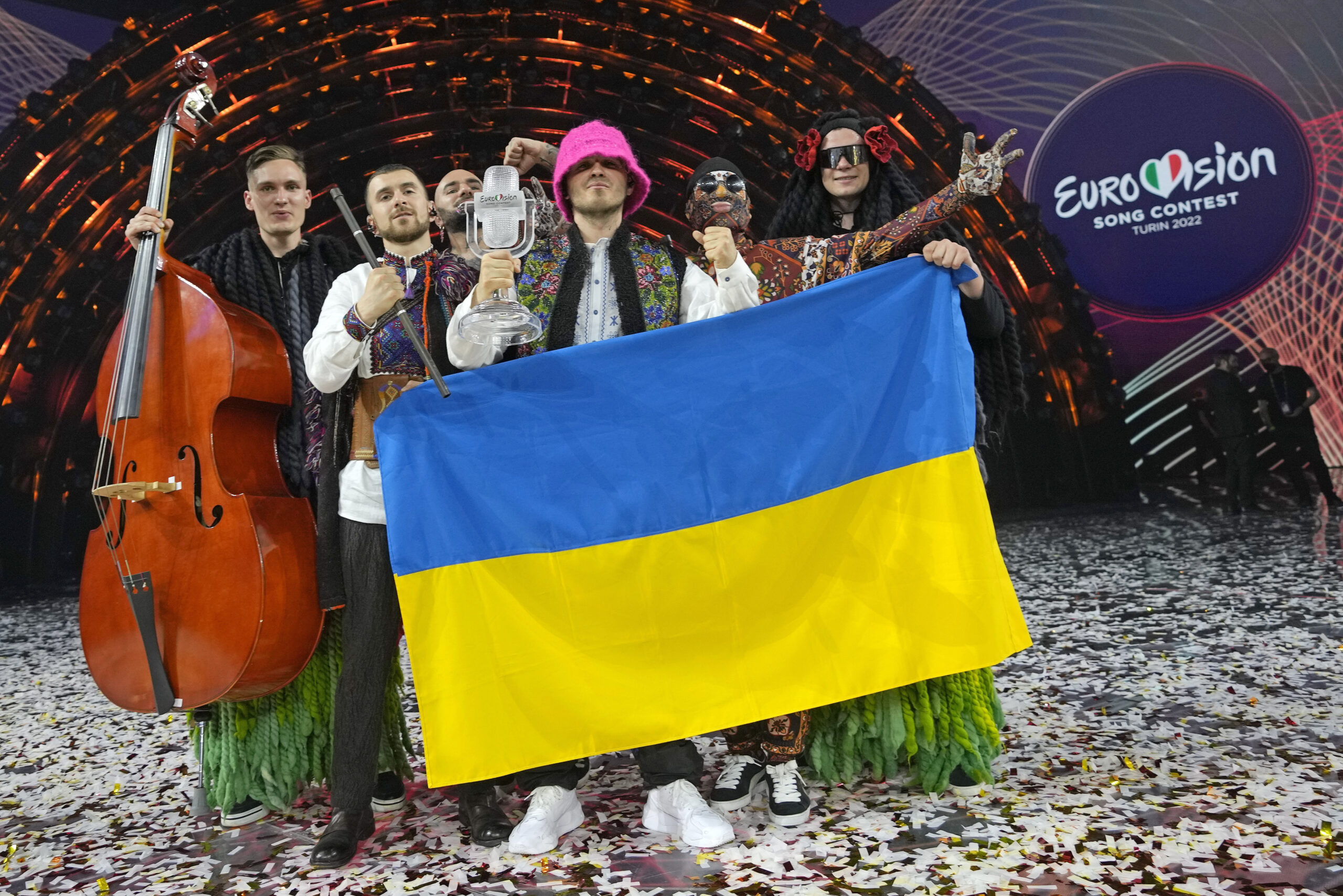 FILE - Kalush Orchestra from Ukraine celebrate after winning the Grand Final of the Eurovision Song Contest at Palaolimpico arena, in Turin, Italy, Saturday, May 14, 2022. Next year’s Eurovision Song Contest will be staged in Britain, organizers announced Monday, July 25, 2022 saying it is too risky to hold it in the designated host country, Ukraine. The U.K. said the 2023 pop extravaganza would be a celebration of Ukrainian culture and creativity. (AP Photo/Luca Bruno, File)