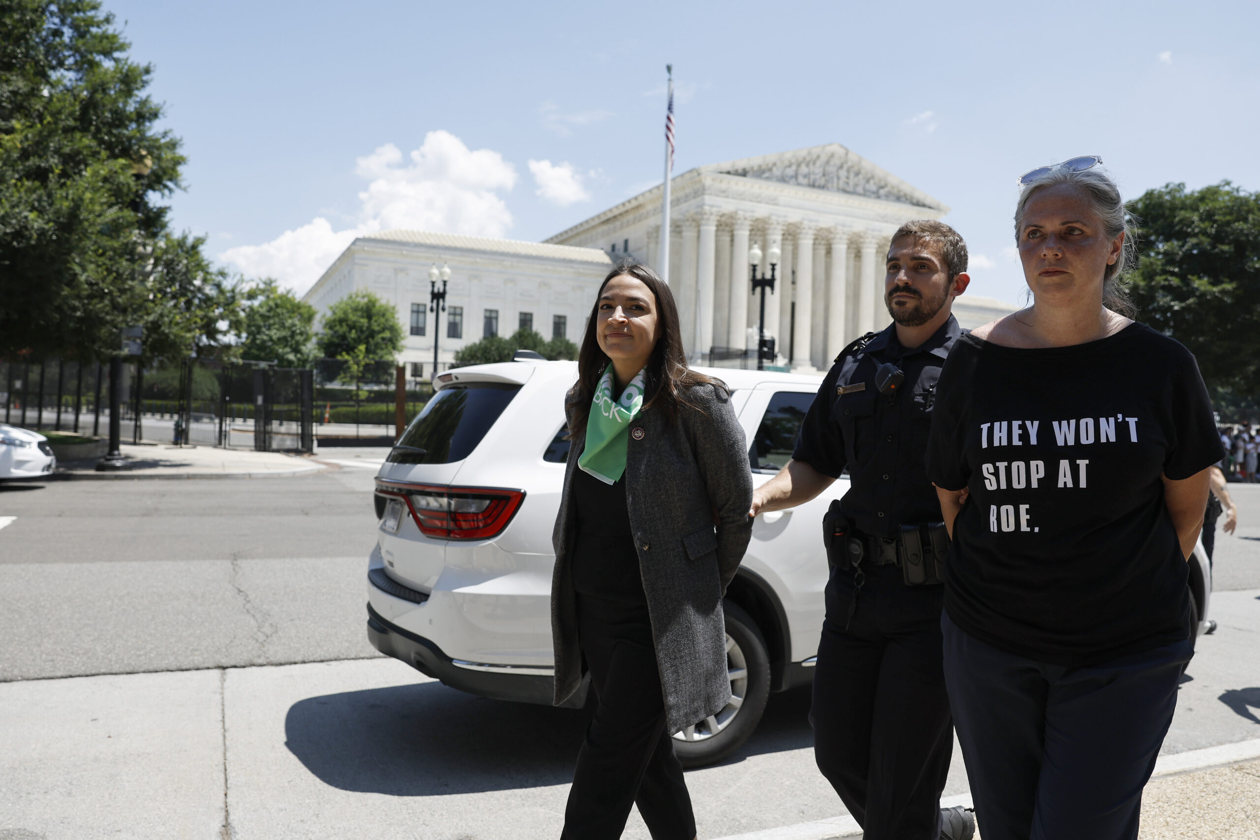 Rep. Alexandria Ocasio-Cortez (D-NY) is detained by U.S. Capitol Police Officers after participating in a sit in with activists from Center for Popular Democracy Action (CPDA) in front of the U.S. Supreme Court Building on July 19, 2022.
