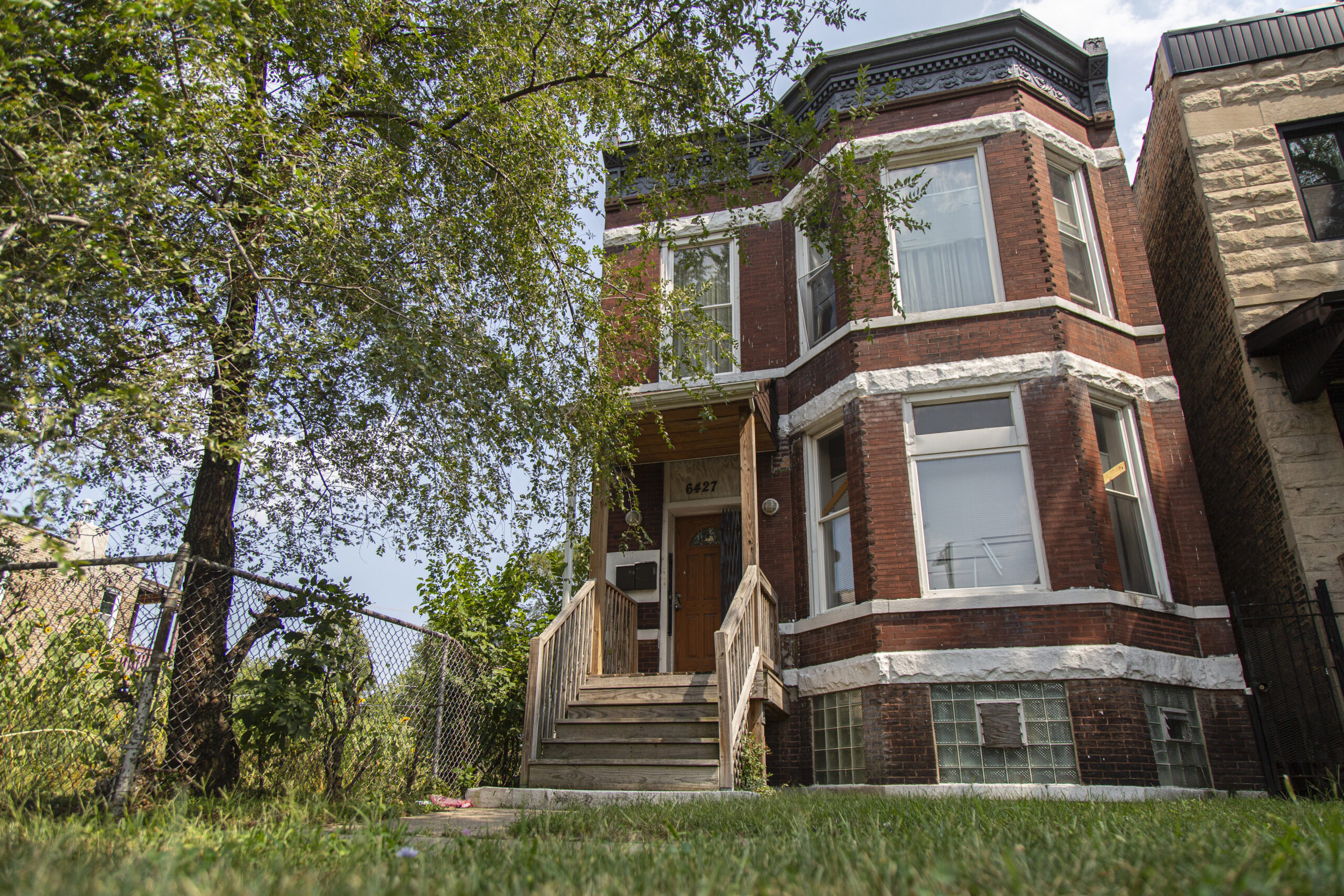 FILE - In this Aug. 26, 2020 file photo, the former home of Emmett and Mamie Till at 6427 S St. Lawrence Avenue is pictured in the West Woodlawn neighborhood of Chicago. Emmett Till's Chicago home is one of more than two dozen historically significant sites that will share in $3 million grant money from a preservation organization. (Anthony Vazquez/Chicago Sun-Times via AP, File)