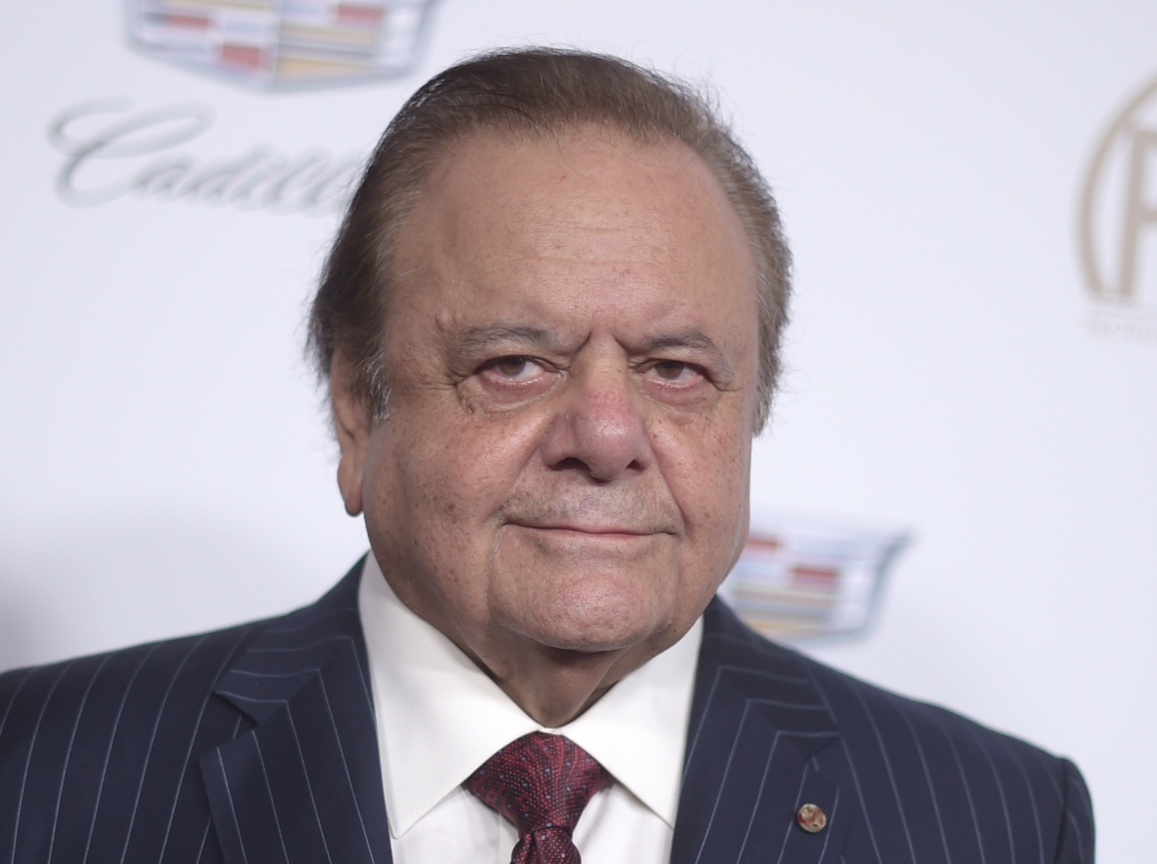 FILE - Paul Sorvino arrives at the 29th annual Producers Guild Awards at the Beverly Hilton on Saturday, Jan. 20, 2018, in Beverly Hills, Calif. Sorvino, an imposing actor who specialized in playing crooks and cops like Paulie Cicero in “Goodfellas” and the NYPD sergeant Phil Cerretta on “Law & Order,” has died. He was 83. (Photo by Richard Shotwell/Invision/AP, File)