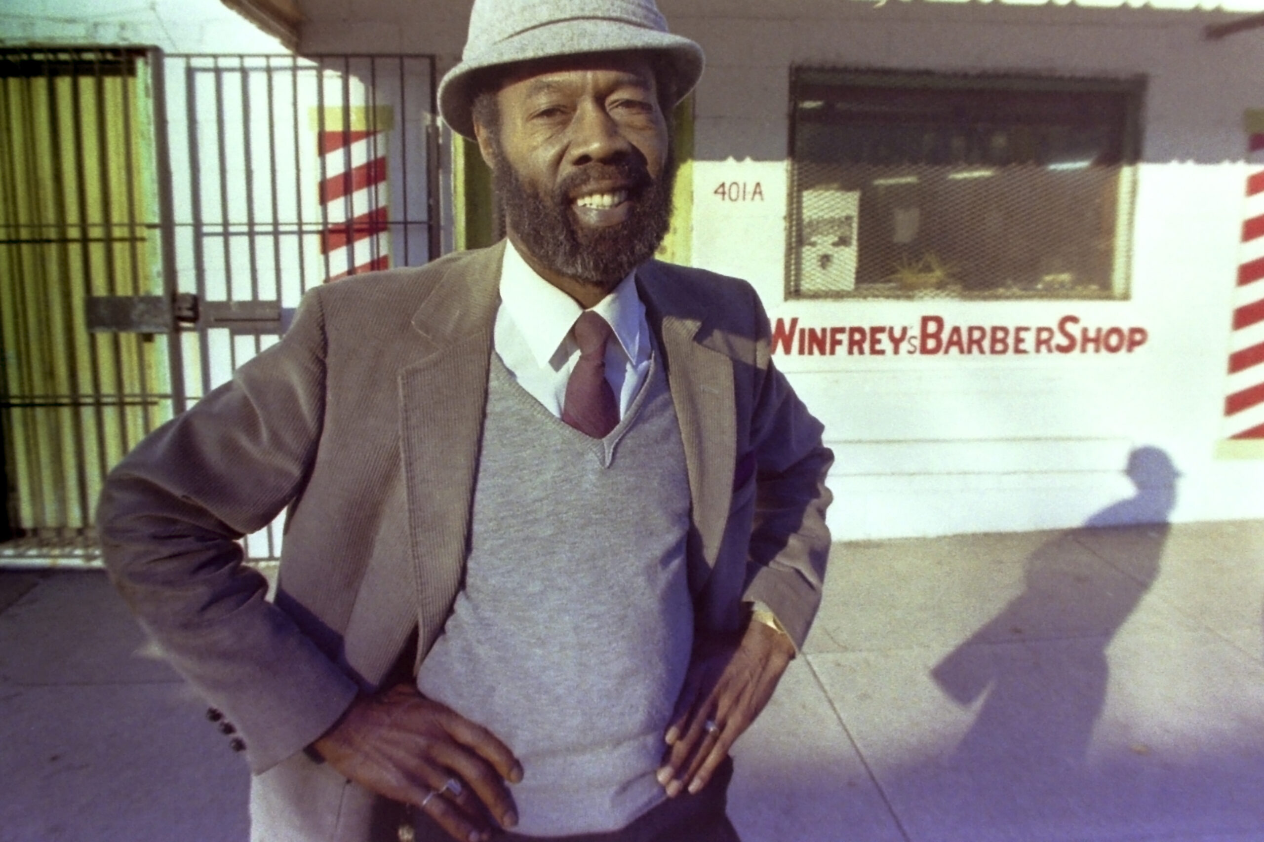 Vernon Winfrey, father of Oprah Winfrey, stands outside his barber shop in Nashville, Tenn., in 1987. Oprah Winfrey confirmed in an Instagram post that her father died Friday, July 8, 2022, at the age of 89. (AP Photo/Mark Humphrey)