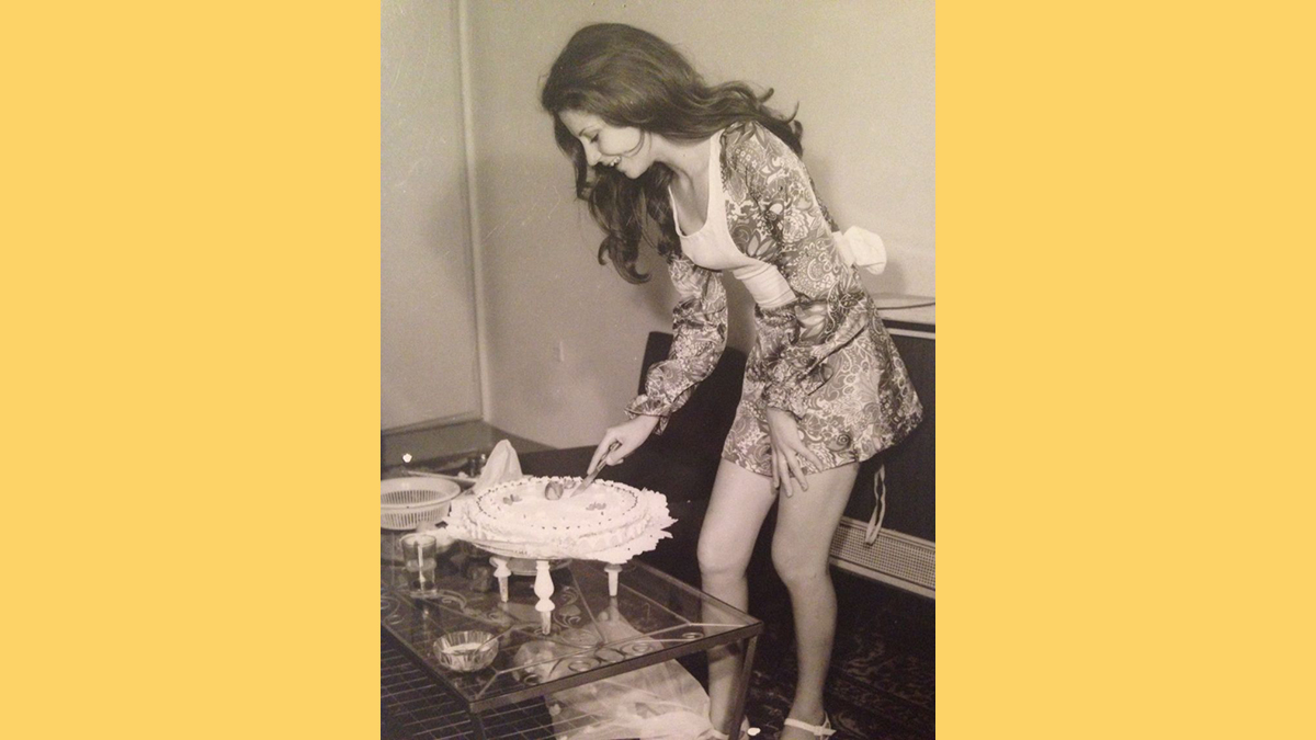 This picture showed a photo of a woman cutting her birthday cake in Iran 1973 5 years before the Islamic Revolution, according to Reddit and Twitter.