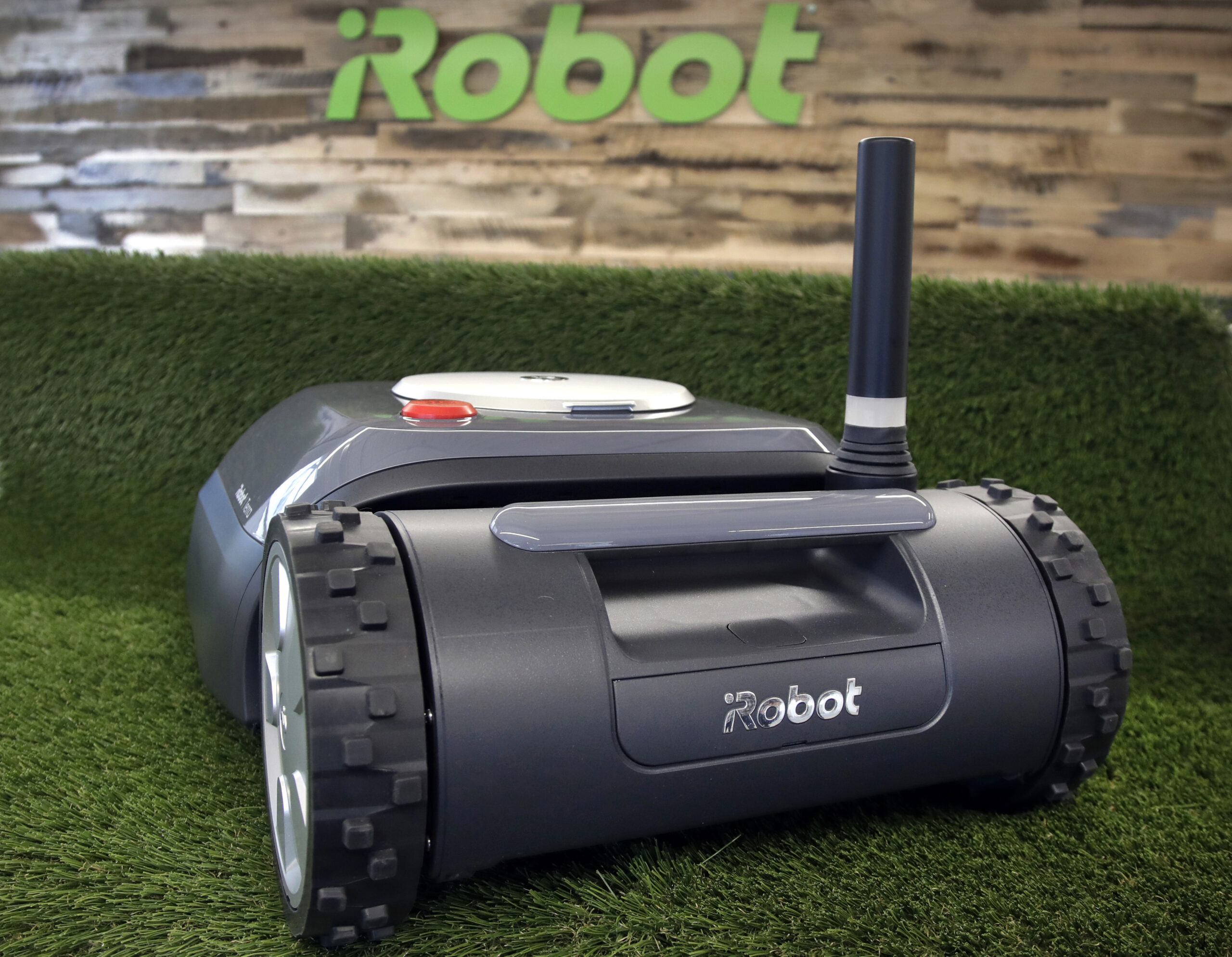 FILE - This Wednesday, Jan. 16, 2019 file photo shows an iRobot Terra lawn mower in Bedford, Mass. Amazon on Friday, Aug. 5, 2022, announced it has entered into an agreement to acquire the iRobot for approximately $1.66 billion. The company sells its robots worldwide and is most famous for the circular-shaped Roomba vacuum. (AP Photo/Elise Amendola, File)
