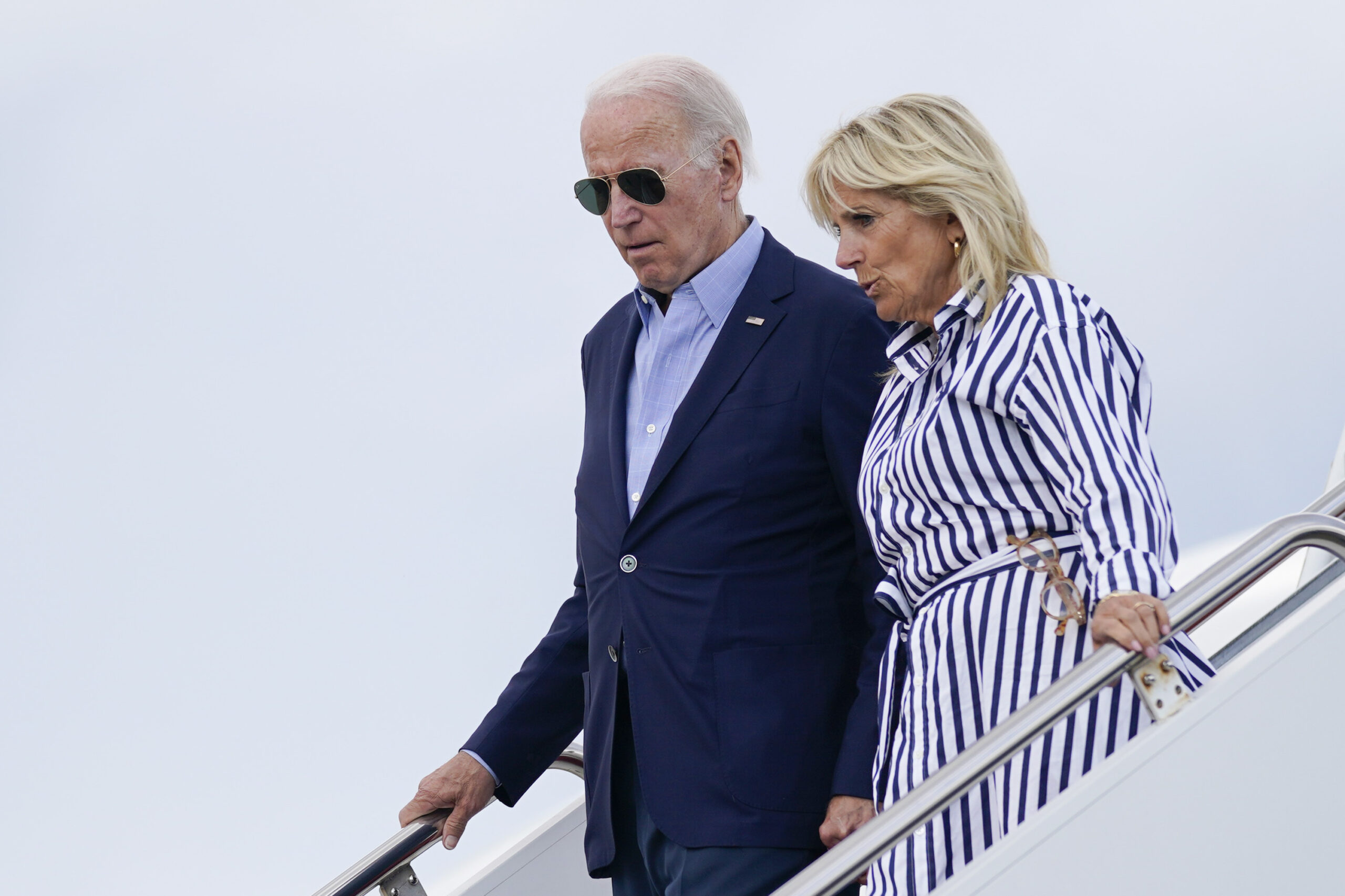 President Joe Biden and first lady Jill Biden arrive at Andrews Air Force Base after spending the day in Kentucky touring areas impacted by floods, Monday, Aug. 8, 2022, at Andrews Air Force Base, Md. (AP Photo/Evan Vucci)