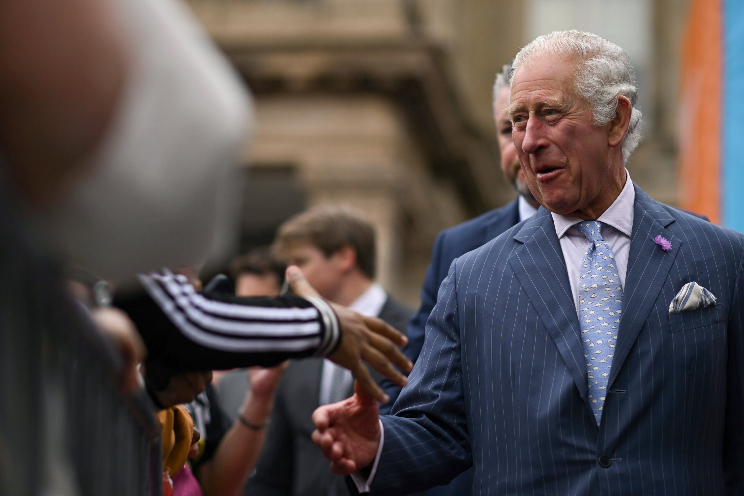 FILE - Britain's Prince Charles visits the Festival Site at Victoria Square before the opening ceremony of the Commonwealth Games, in Birmingham, England, Thursday July 28, 2022. Britain’s Prince Charles is facing more questions over his charities after a newspaper reported that one of his funds accepted a 1 million-pound ($1.2 million) donation from relatives of Osama bin Laden. The Sunday Times reported that the Prince of Wales’s Charitable Fund received the money in 2013 from Bakr bin Laden and his brother Shafiq. (Ben Stansall/Pool photo via AP, File)