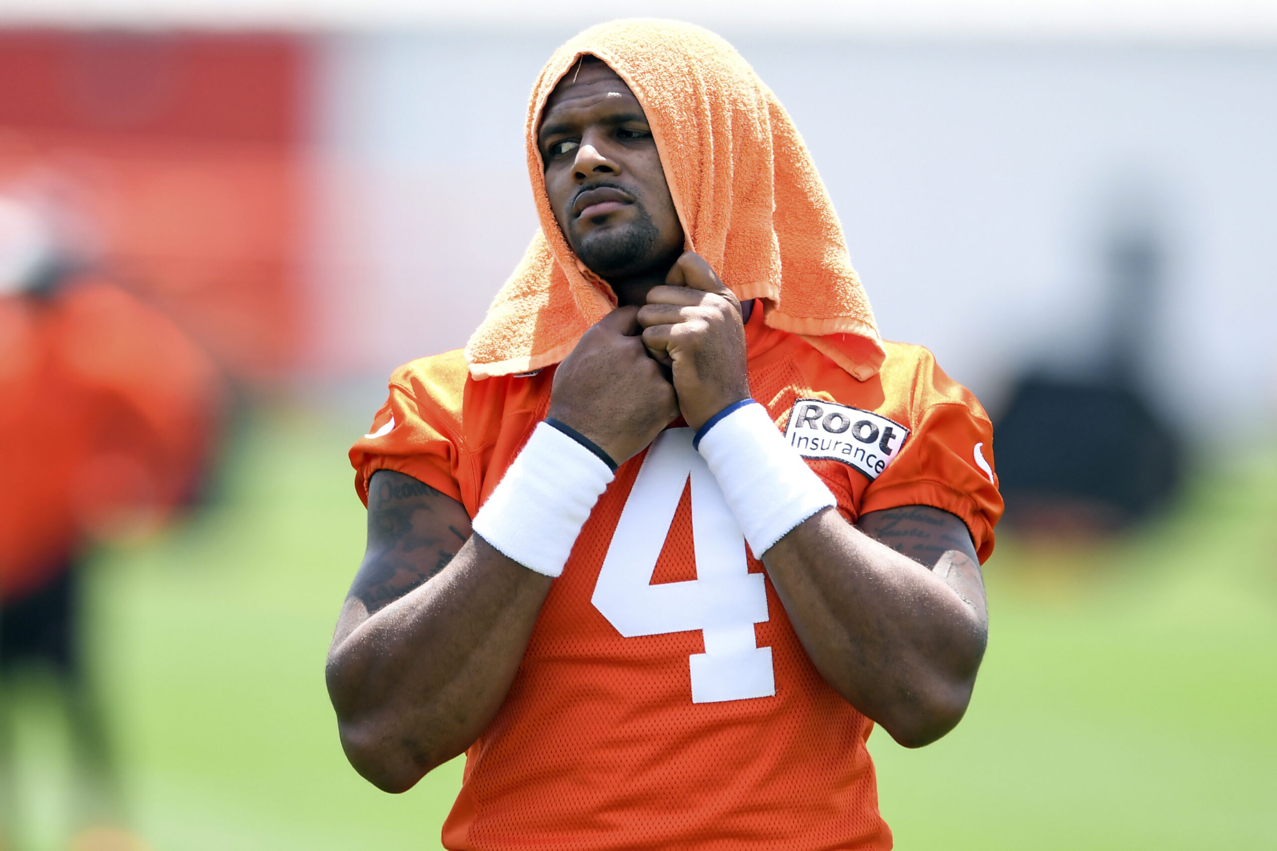 FILE - Cleveland Browns quarterback Deshaun Watson looks on during the NFL football team's training camp, Thursday, July 28, 2022, in Berea, Ohio. Watson was suspended without pay for six games Monday, Aug. 1, 2022, for violating the NFL's personal conduct policy following accusations of sexual misconduct made against him by two dozen women in Texas, two people familiar with the decision said. (AP Photo/Nick Cammett, File)