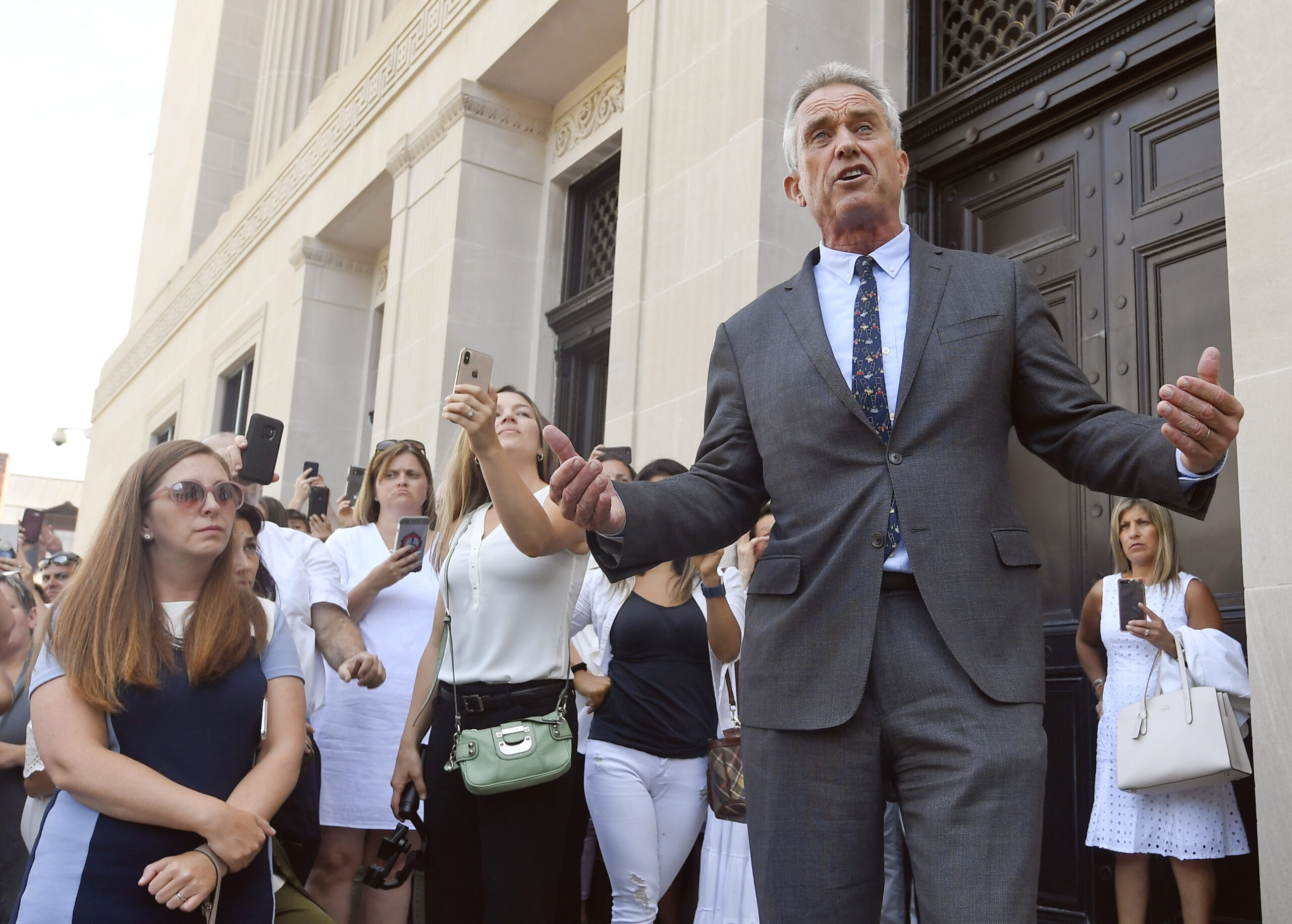 FILE - Attorney Robert F. Kennedy, Jr. speaks after a hearing challenging the constitutionality of the state legislature's repeal of the religious exemption to vaccination on behalf of New York state families who held lawful religious exemptions, during a rally outside the Albany County Courthouse Aug. 14, 2019, in Albany, N.Y. Instagram and Facebook have suspended Children's Health Defense from its platforms for repeated violations of its policies on COVID-19 misinformation. The nonprofit led by Robert Kennedy Jr. is regularly criticized by public health advocates for its misleading claims about vaccines and the COVID-19 pandemic. (AP Photo/Hans Pennink, File)