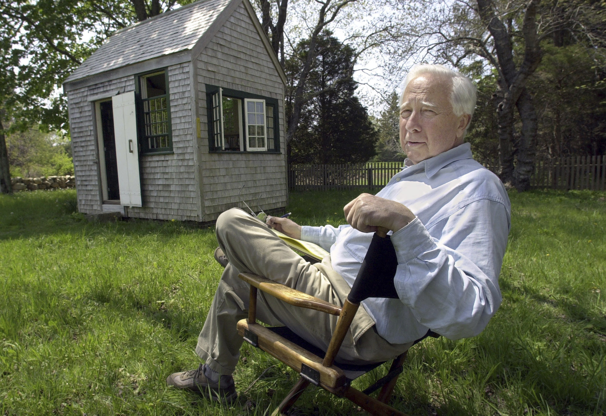 FILE - Writer and historian David McCullough appears at his Martha's Vineyard property in West Tisbury, Mass., on May 12, 2001. McCullough, the Pulitzer Prize-winning author whose lovingly crafted narratives on subjects ranging from the Brooklyn Bridge to Presidents John Adams and Harry Truman made him among the most popular and influential historians of his time, died Sunday in Hingham, Massachusetts. He was 89. (AP Photo/Steven Senne, File)
