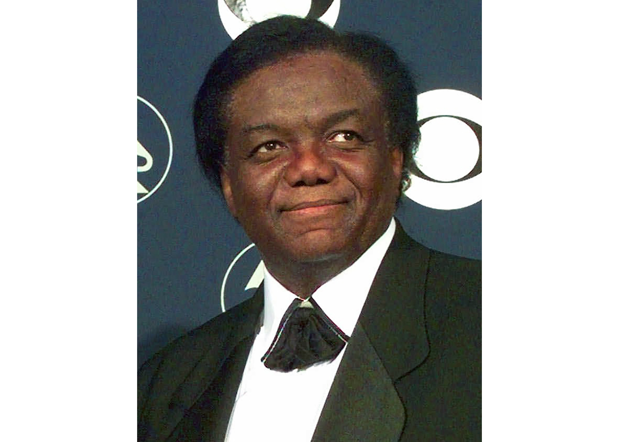 FILE - Songwriter/producer Lamont Dozier appears at the 40th Annual Grammy Awards in New York on Feb. 25, 1998. Dozier, of the celebrated Holland-Dozier-Holland team that wrote and produced “You Can’t Hurry Love,” “Heat Wave” and dozens of other hits and helped make Motown an essential record company of the 1960s and beyond, has died at age 81. (AP Photo/Richard Drew, File)