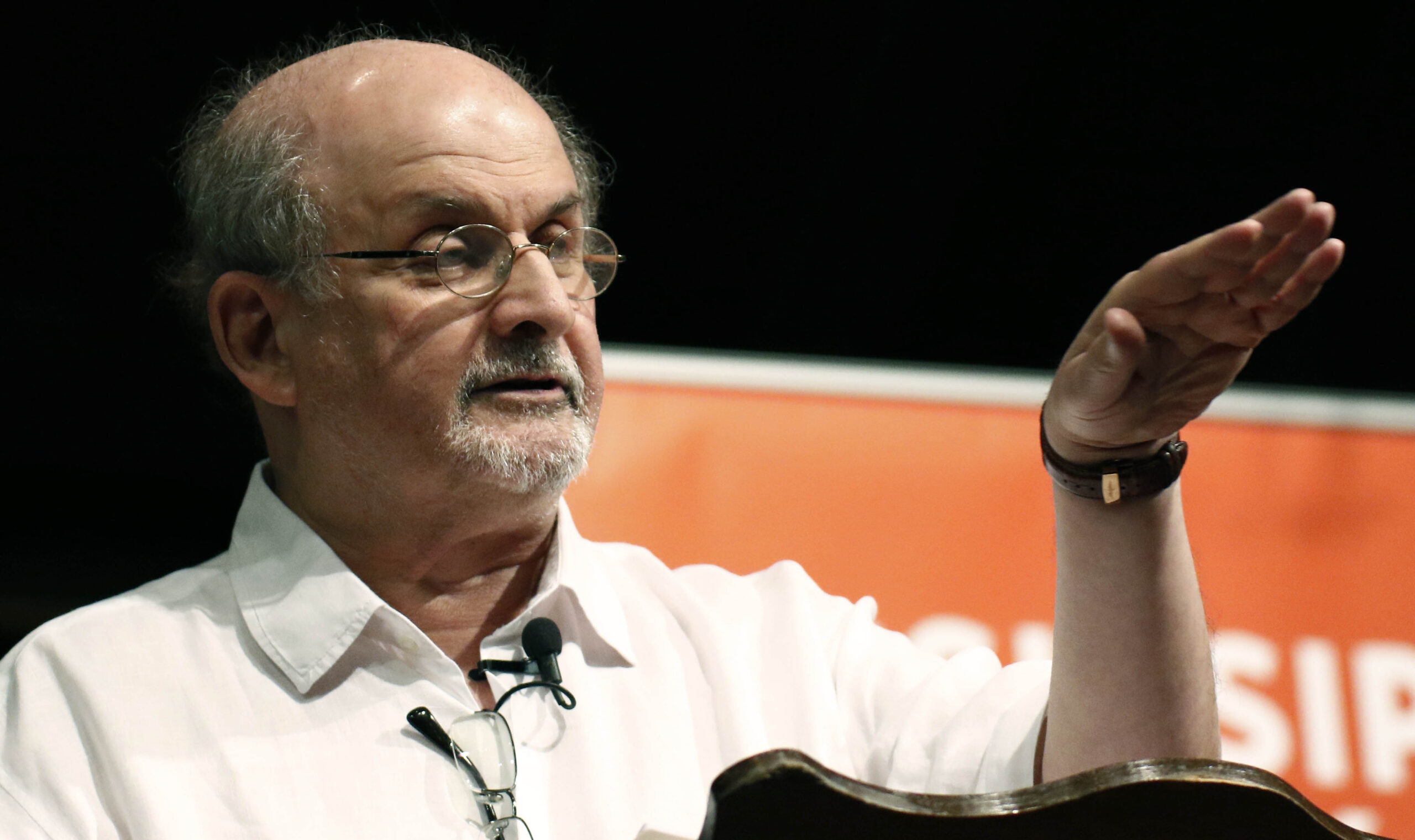 FILE — Author Salman Rushdie talks about the start of his writing career, during the Mississippi Book Festival, in Jackson, Miss., on Aug. 18, 2018. Rushdie, the author whose writing led to death threats from Iran in the 1980s, was attacked Friday while giving a lecture in western New York. (AP Photo/Rogelio V. Solis, File)