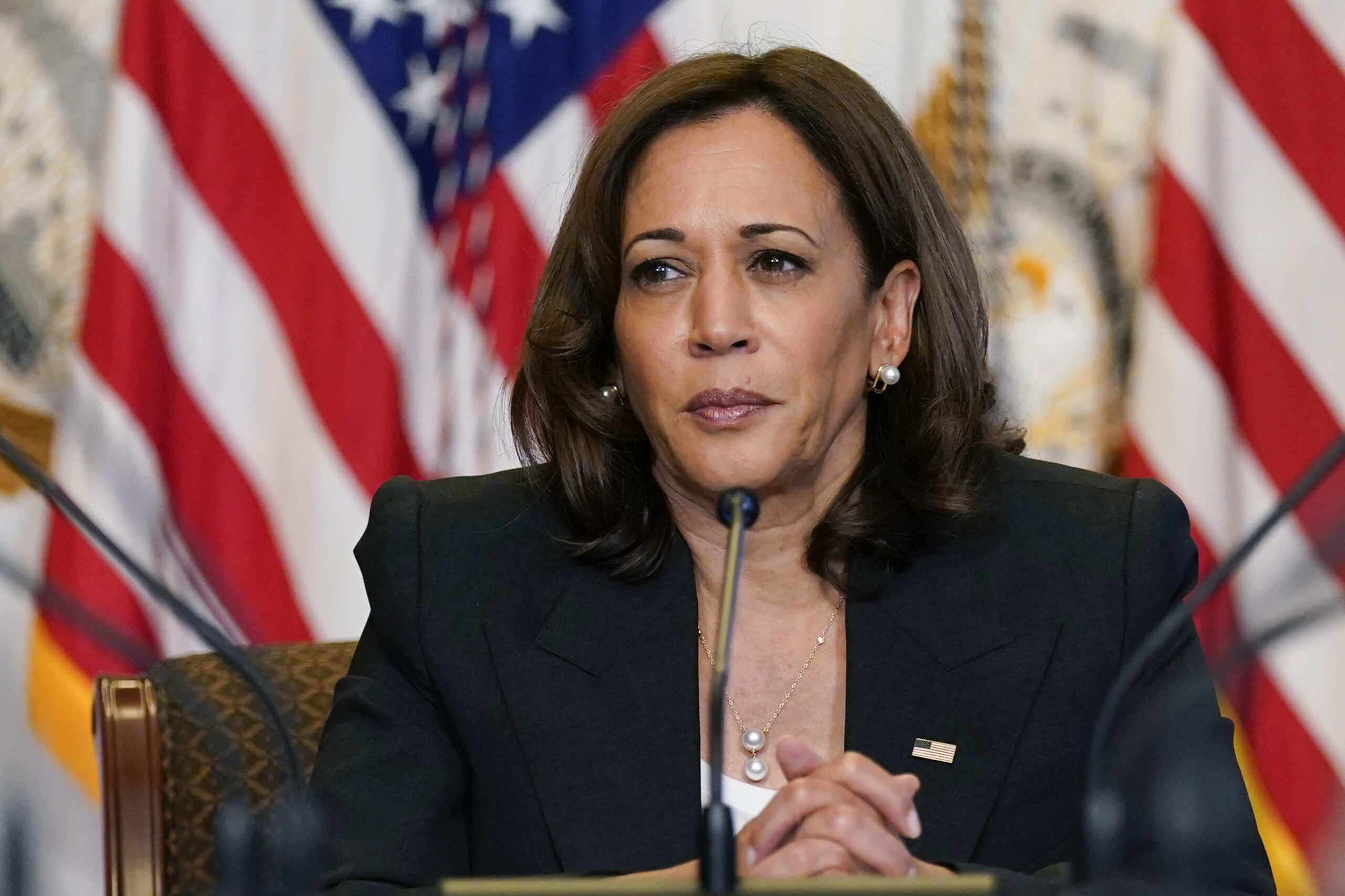 FILE - Vice President Kamala Harris listens during a meeting with civil rights and reproductive rights leaders in the Diplomatic Reception Room on the White House complex in Washington, Sept. 12, 2022. Two buses of migrants from the U.S.-Mexico border were dropped off near Harris' home in residential Washington on Thursday, Sept. 15. (AP Photo/Susan Walsh, File)