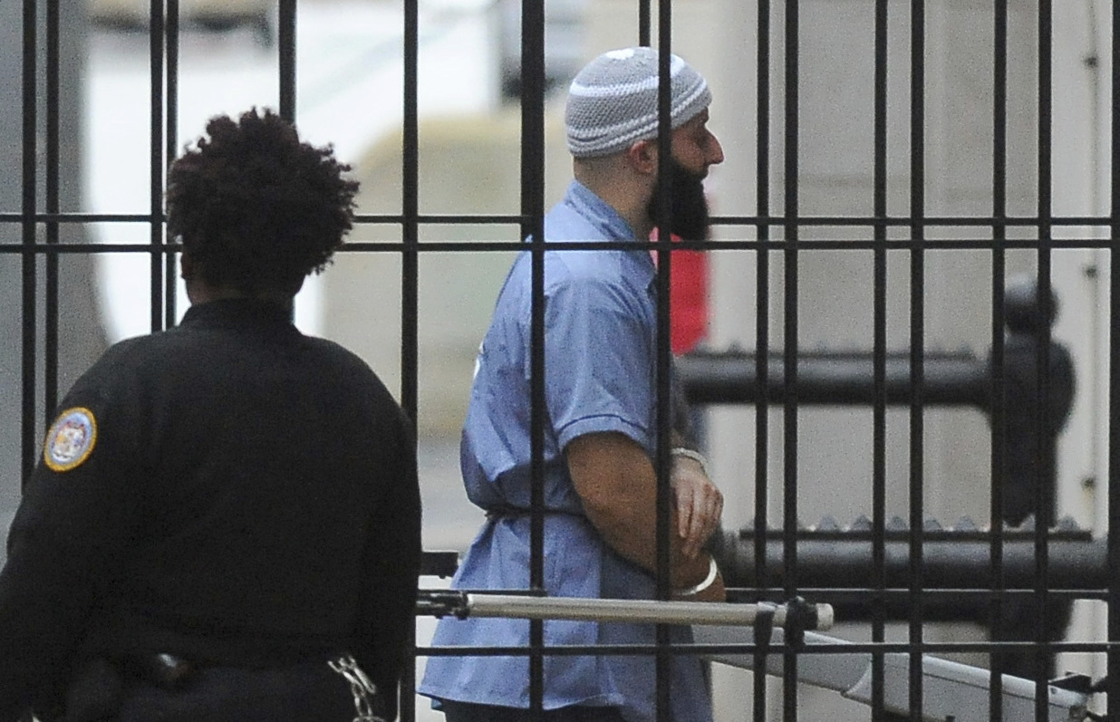 FILE - Adnan Syed enters Courthouse East prior to a hearing on Feb. 3, 2016, in Baltimore. A court hearing has been set for Monday, Sept. 19, 2022 in Baltimore to consider a request from prosecutors to vacate the 2000 murder conviction of Adnan Syed, whose case was chronicled in the hit podcast “Serial.”(Barbara Haddock Taylor/The Baltimore Sun via AP, File)
