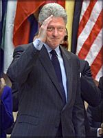 Bill Clinton saluting